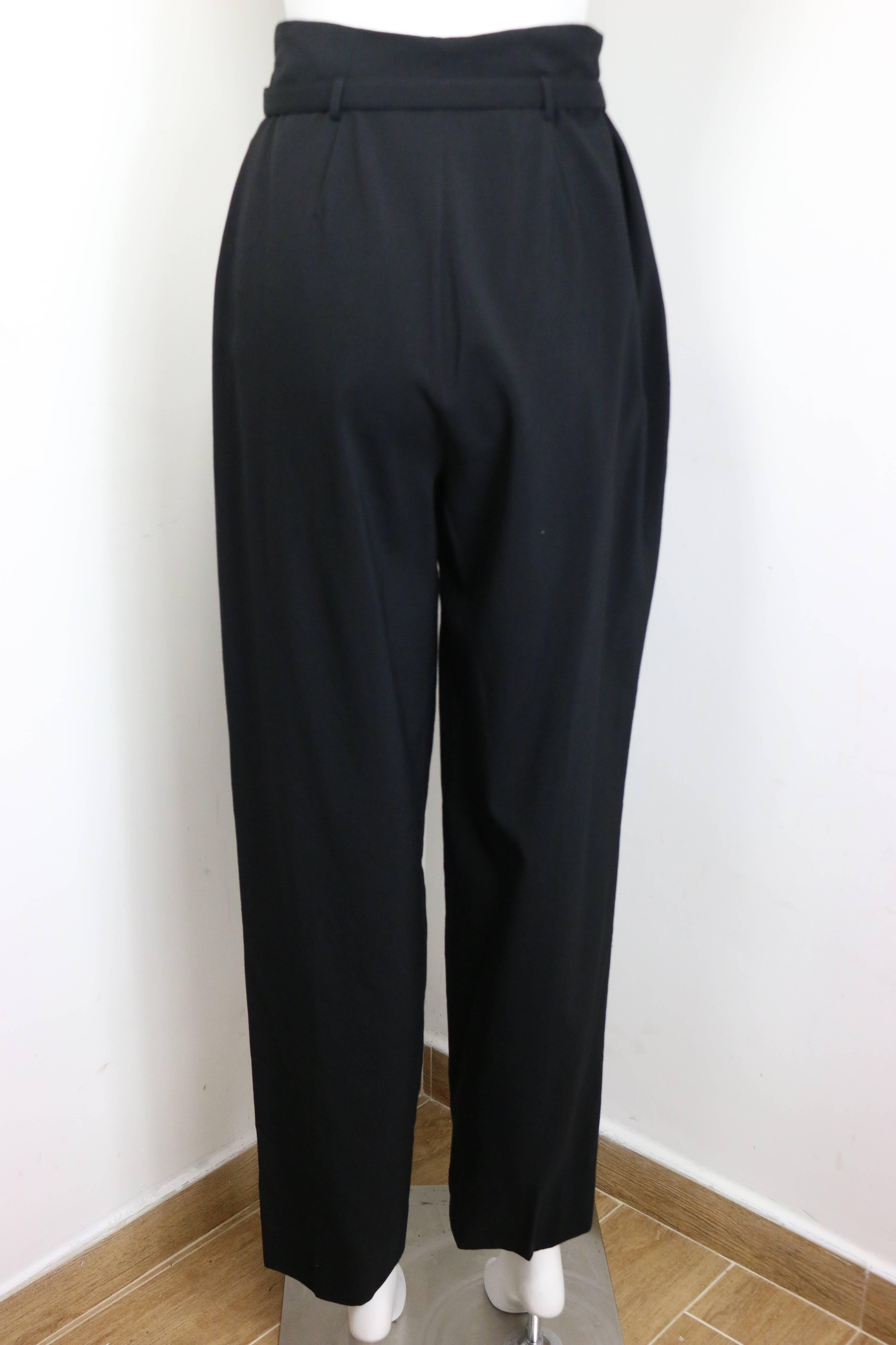 - Vintage black wool carrot pants from year 1998 Pre collection. Featuring a zipper and snap button with a wool 