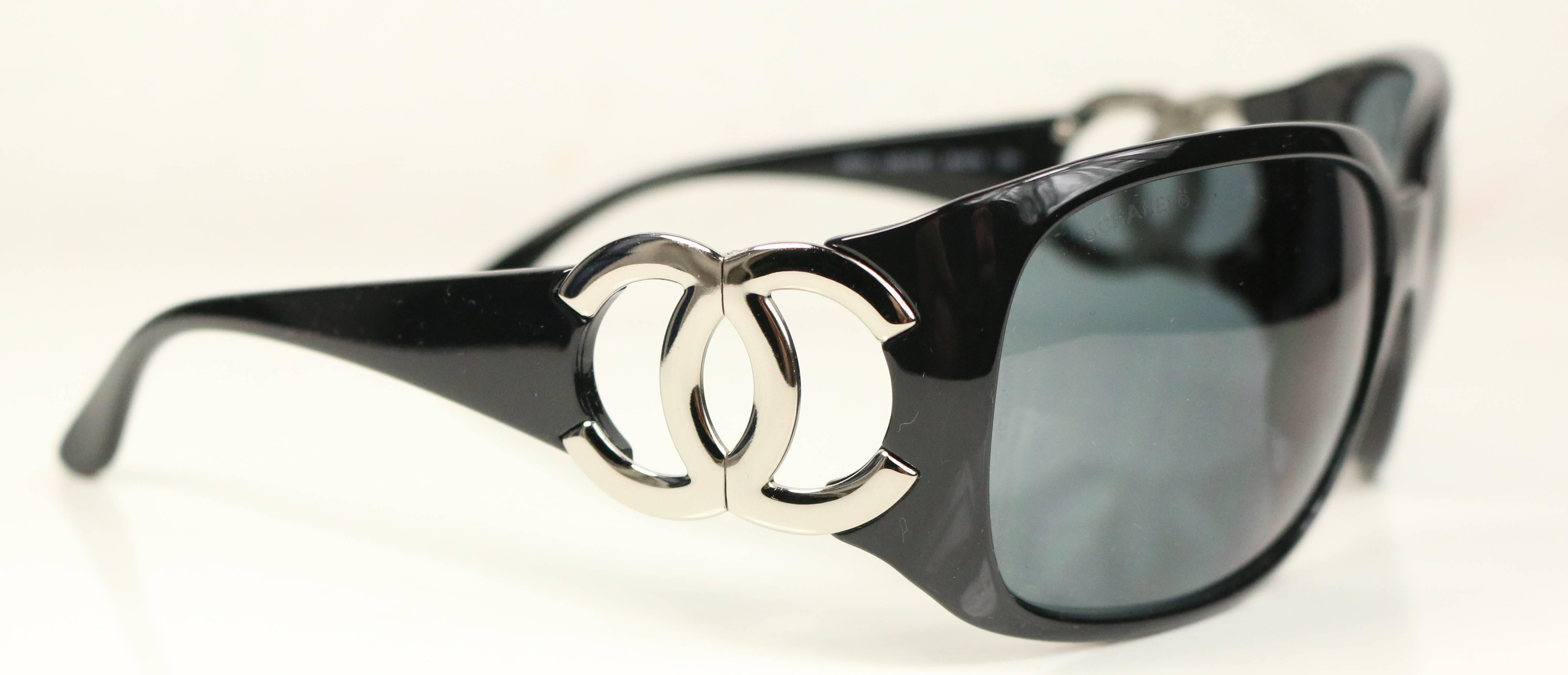 - Chanel black frame with silver tone hinged 