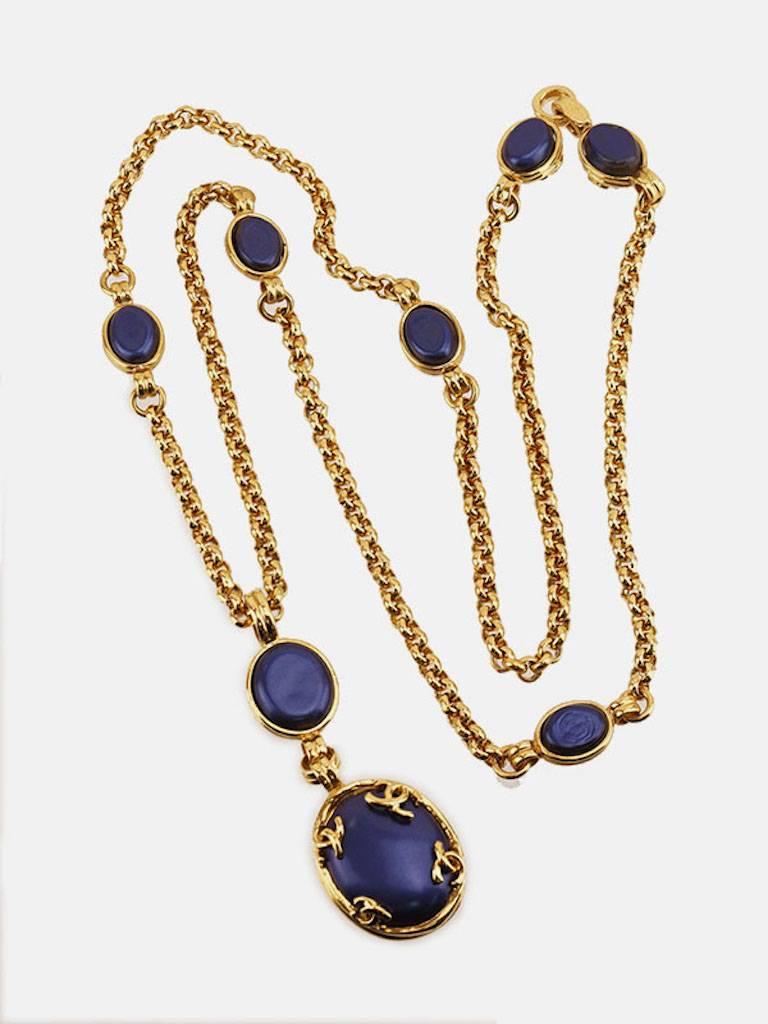 - Vintage 90s Chanel gold plated blue oval gripoix 