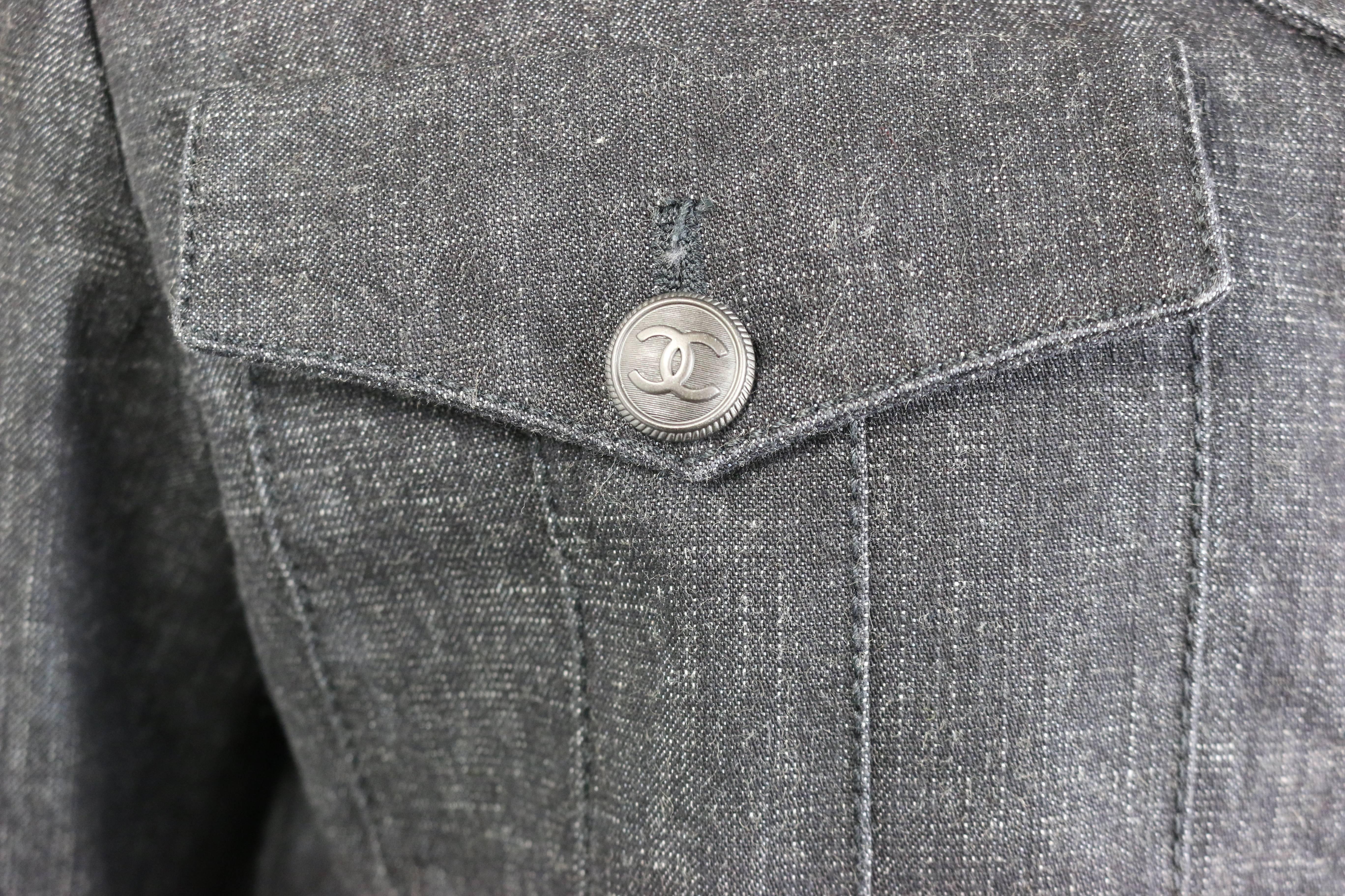 - Chanel grey denim with wool sleeves jacket from 2003 A/W collection. Featuring three black 