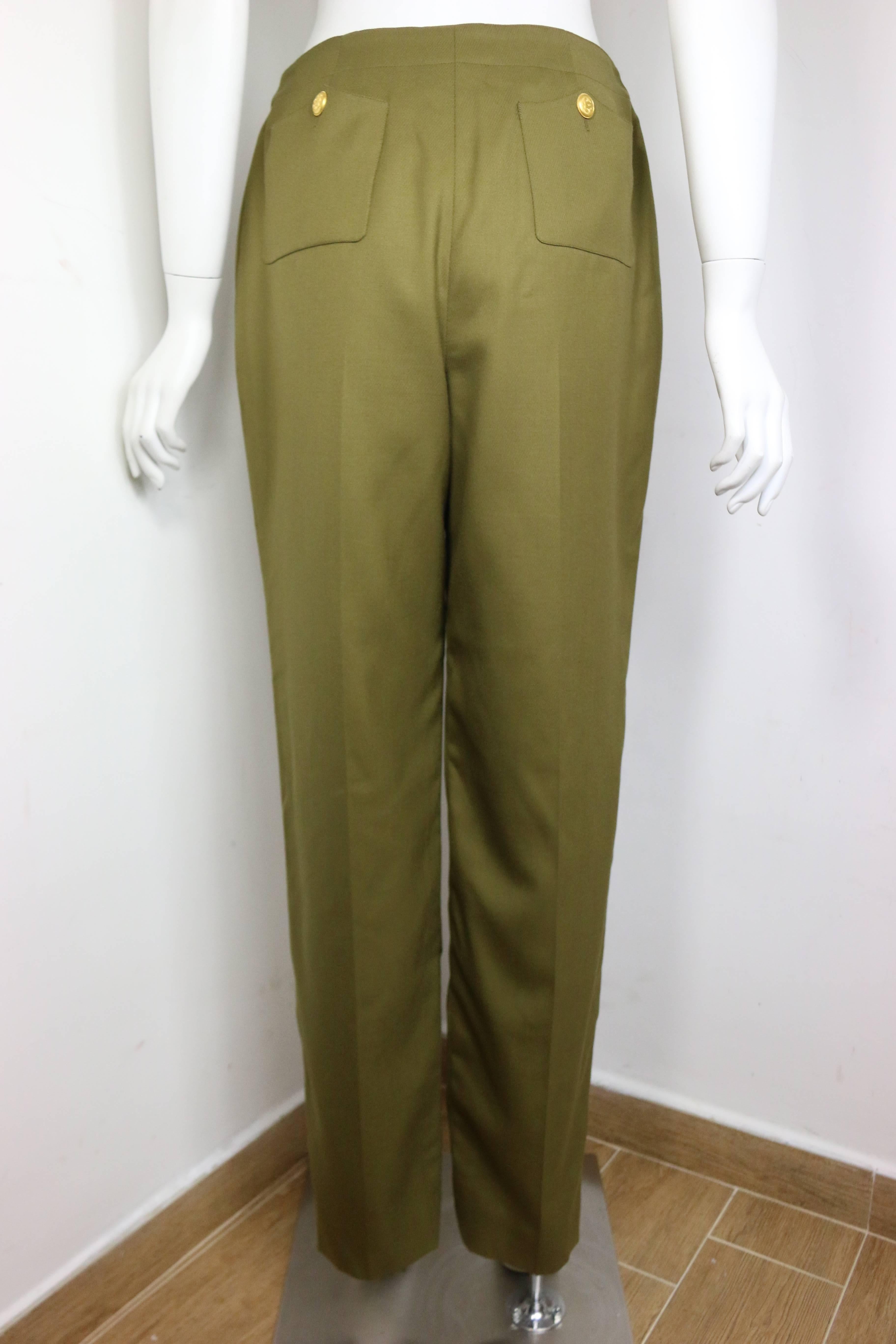 - Vintage Chanel army green wool military style straight leg pants from 1996 A/W collection. Featuring a gold toned 