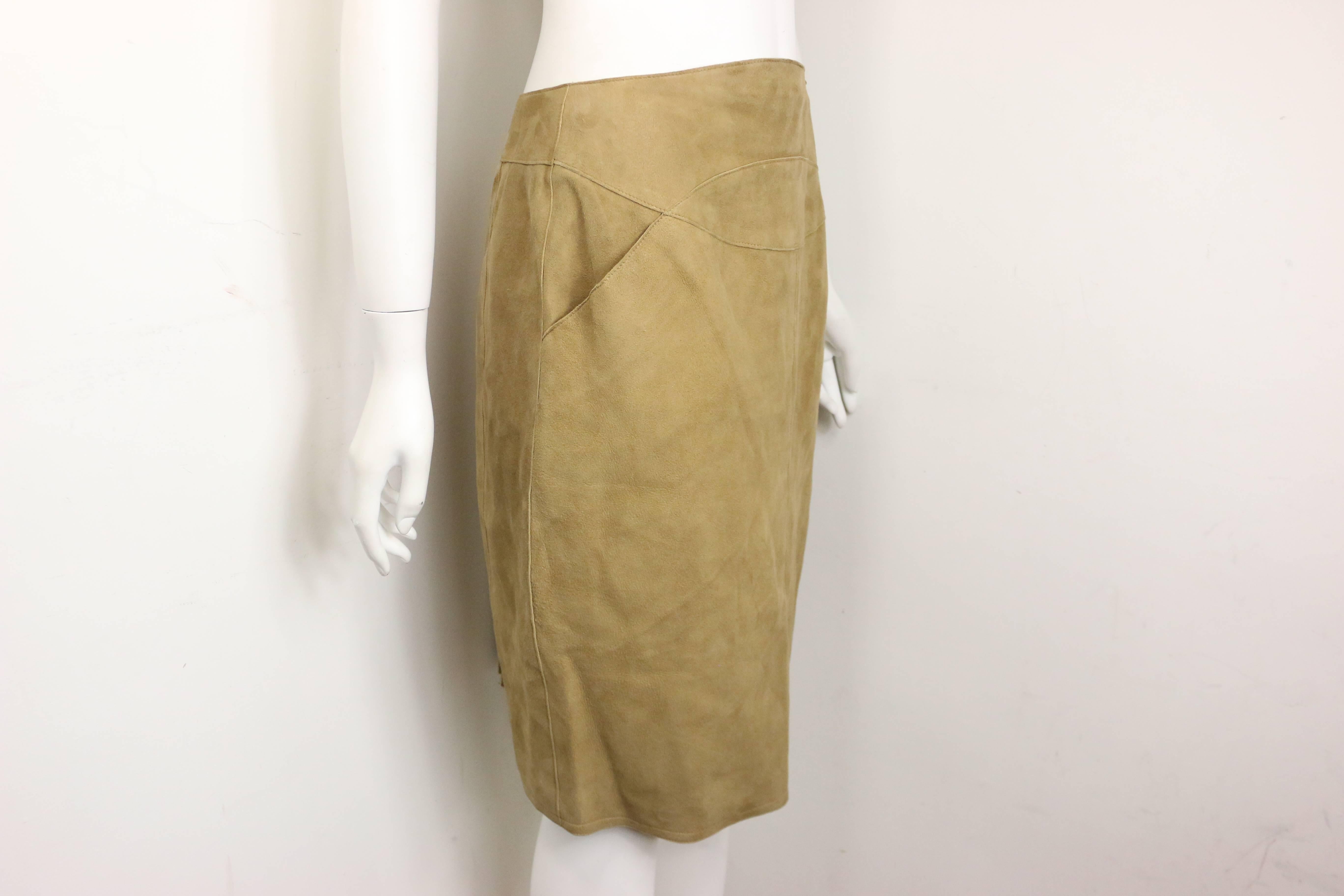 - Vintage Chanel suede lambskin leather knee length pencil skirt from 1999 A/W collection. This sexy and luxury knee length pencil skirt can be worn with many things. The silk lining is always a comfort touch!  

- Featuring two side pockets.   

-