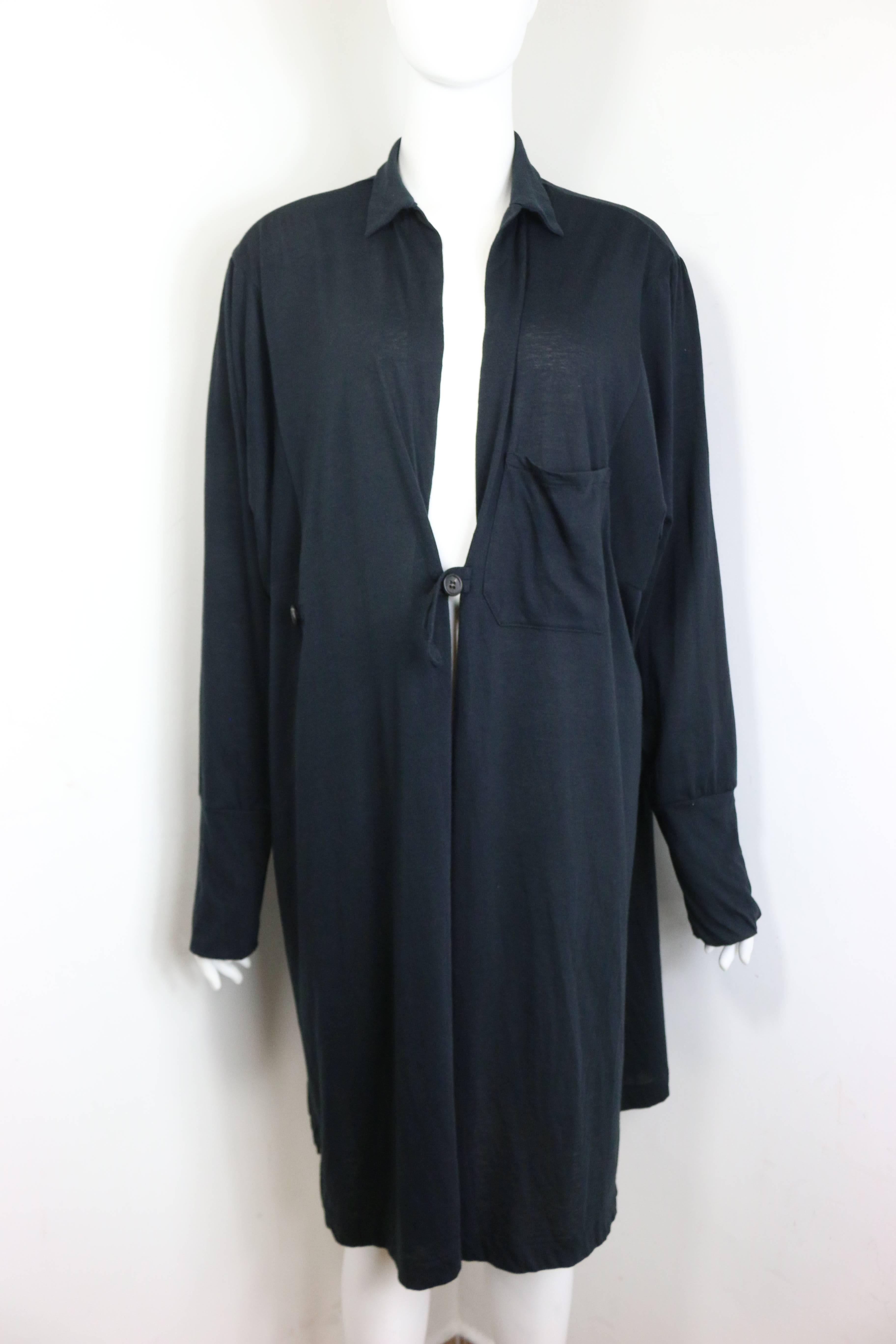 - Y's by Yohji Yamamoto black long cotton coat. Featuring a front open pocket and two buttons closure. Dark, black and long silhouette are always the signature of master Yohji. 

- Made in Japan. 

- Size 2. 

- 65% Polyester, 35% Cotton. 

