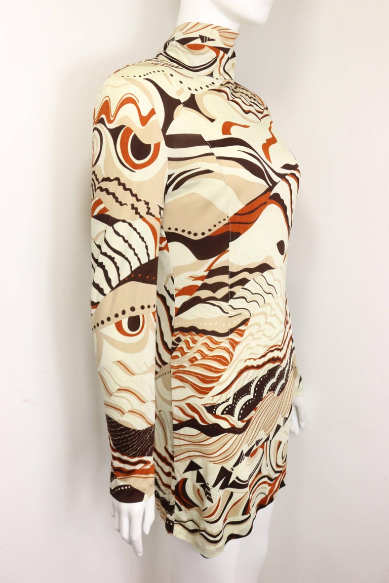- Vintage 90s Costume National beige retro wave pattern long sleeves dress. Featuring a high neck with a back zipper. 

- Made in Italy. 

- Size 42. 

- 65% Acetate, 35% Nylon. 

