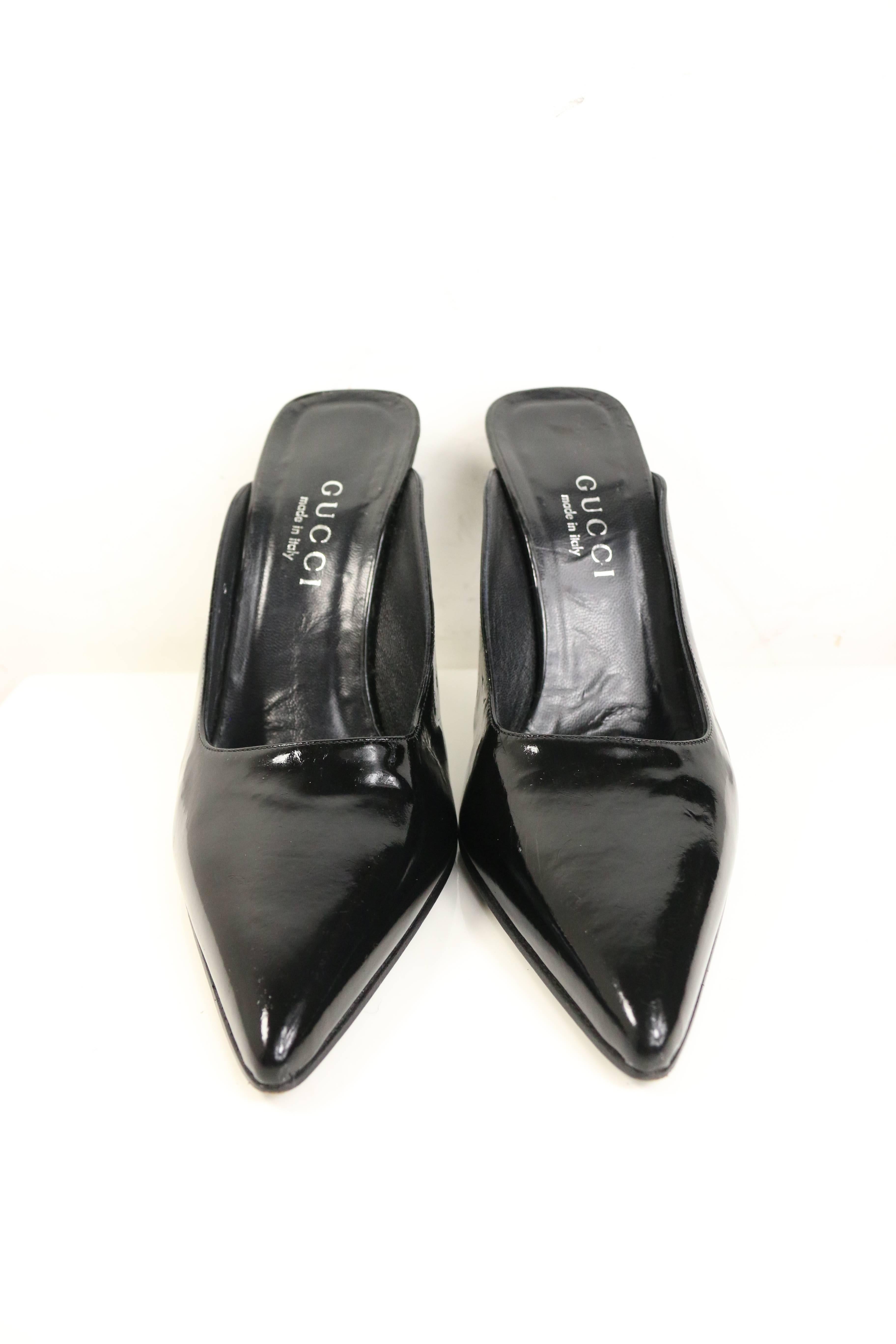 - Gucci by Tom Ford black patent leather pointy mules with silver metal heels from spring 1997 collection. 

- Made in Italy. 

- Size 38. 