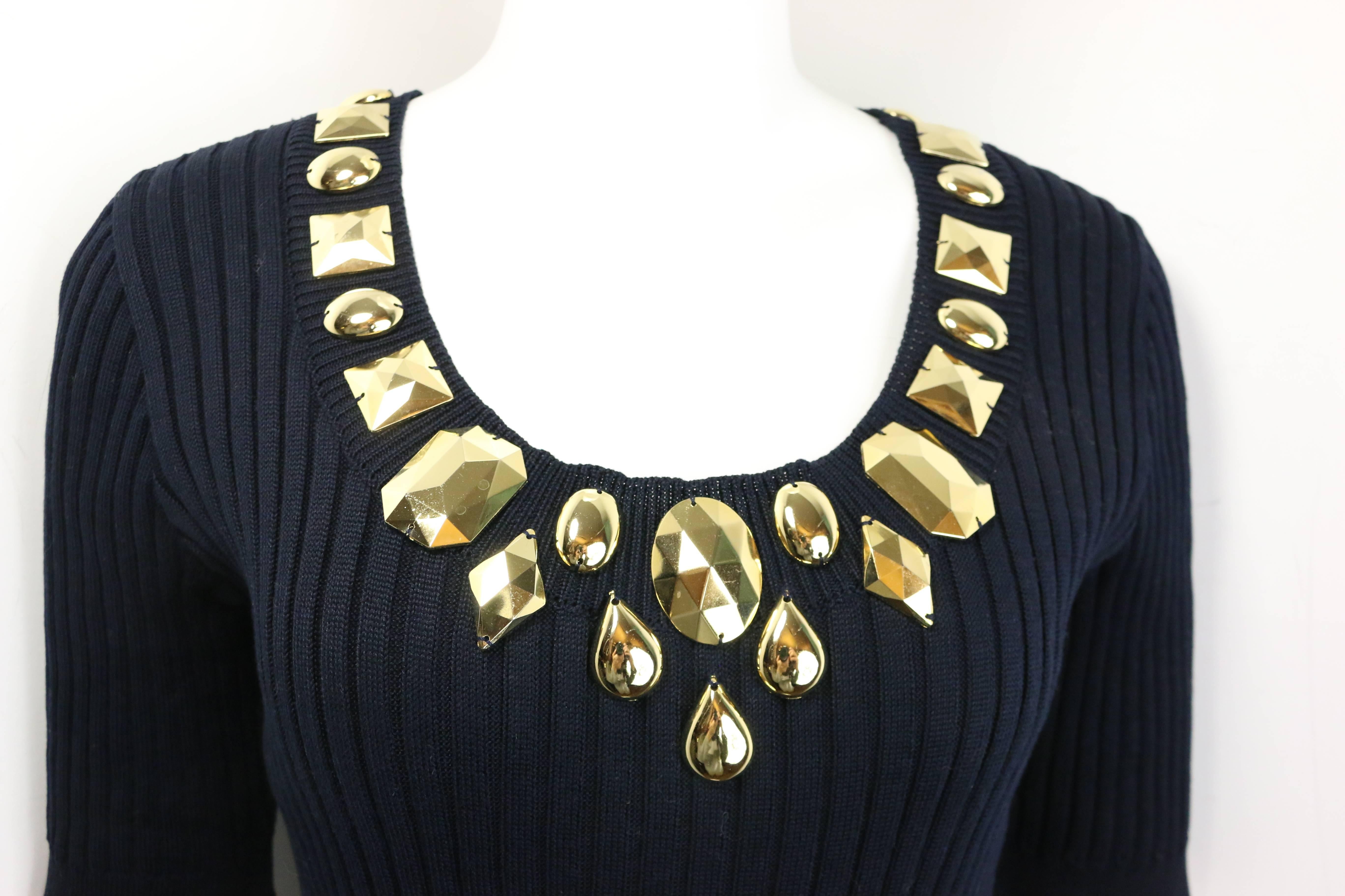 - Vintage 80s Escada black cotton gold toned charms u neck short sleeves top. 

- Made in Germany. 

- Size 38. 

- 100% Cotton. 

