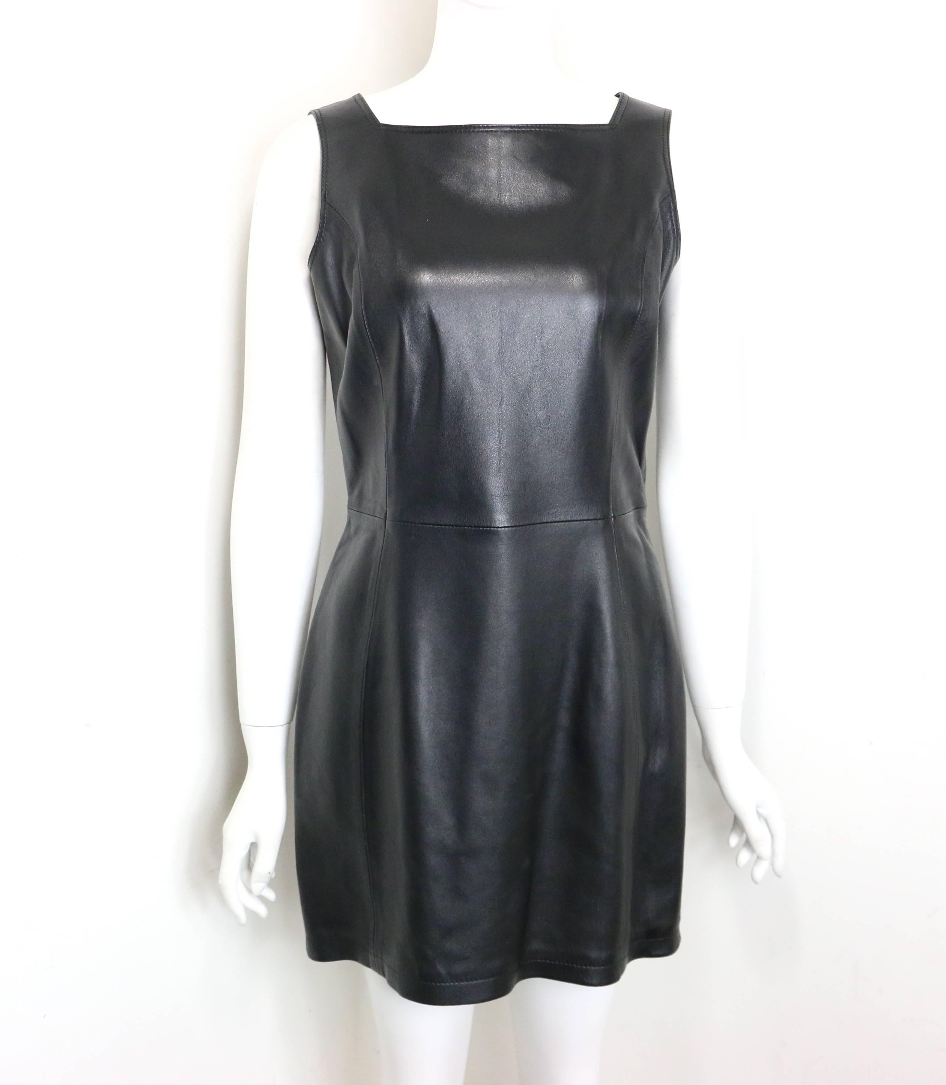 - Vintage 90s Gianni Versace iconic black leather back cut out dress. Featuring a V- shape straps at the back and round neck in front. side zipper closure. 20 years ago, one of the legendary and talented designer Gianni Versace passed away, their