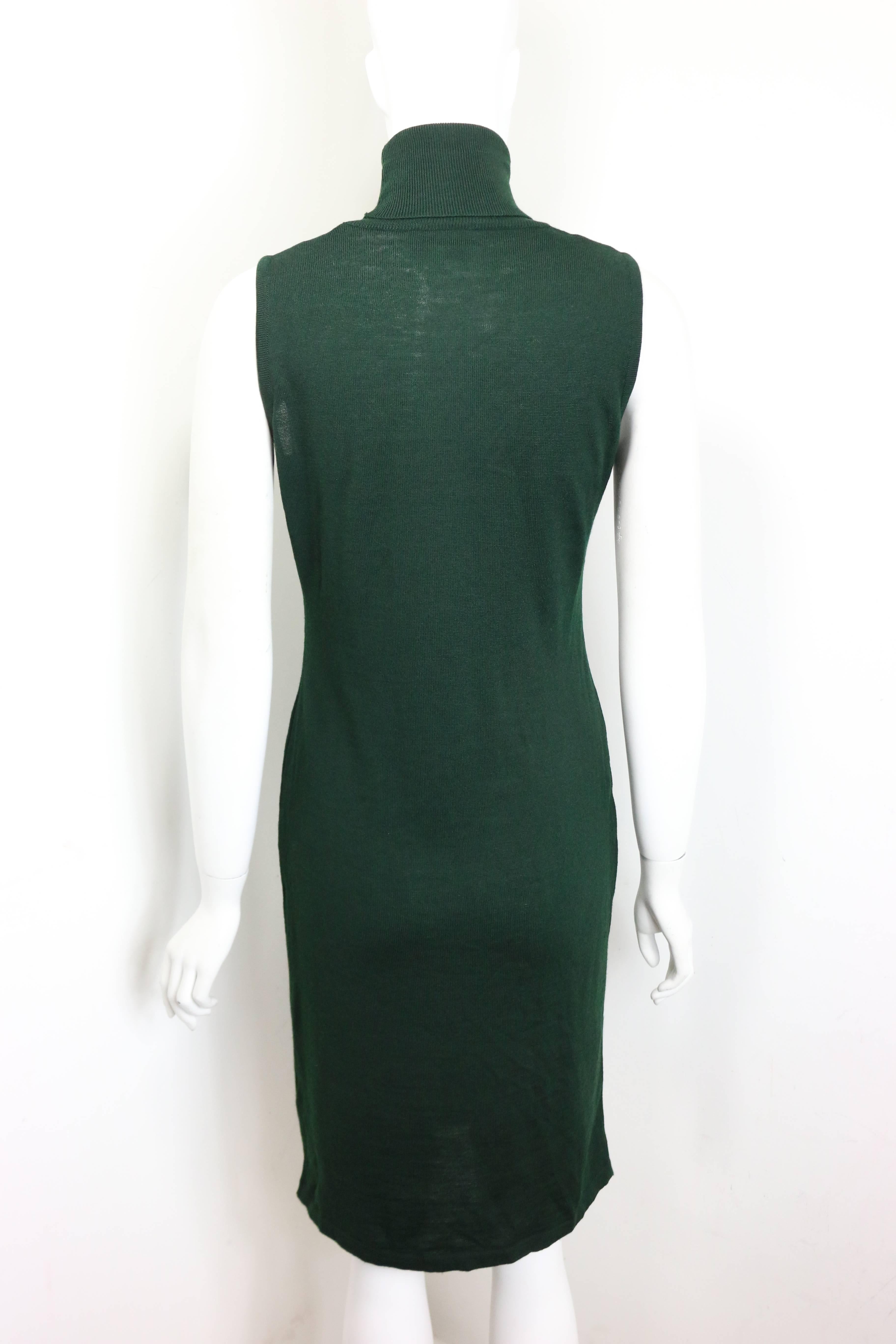 - Vintage 90s Versace Jeans Couture green wool sleeveless turtle neck dress. This simple and classic dark green dress is subtle for day time or an evening night out. 

- Made in Italy.

- Size M. 

- Shoulder: 11 inches. Bust: 28 inches. Height: 39