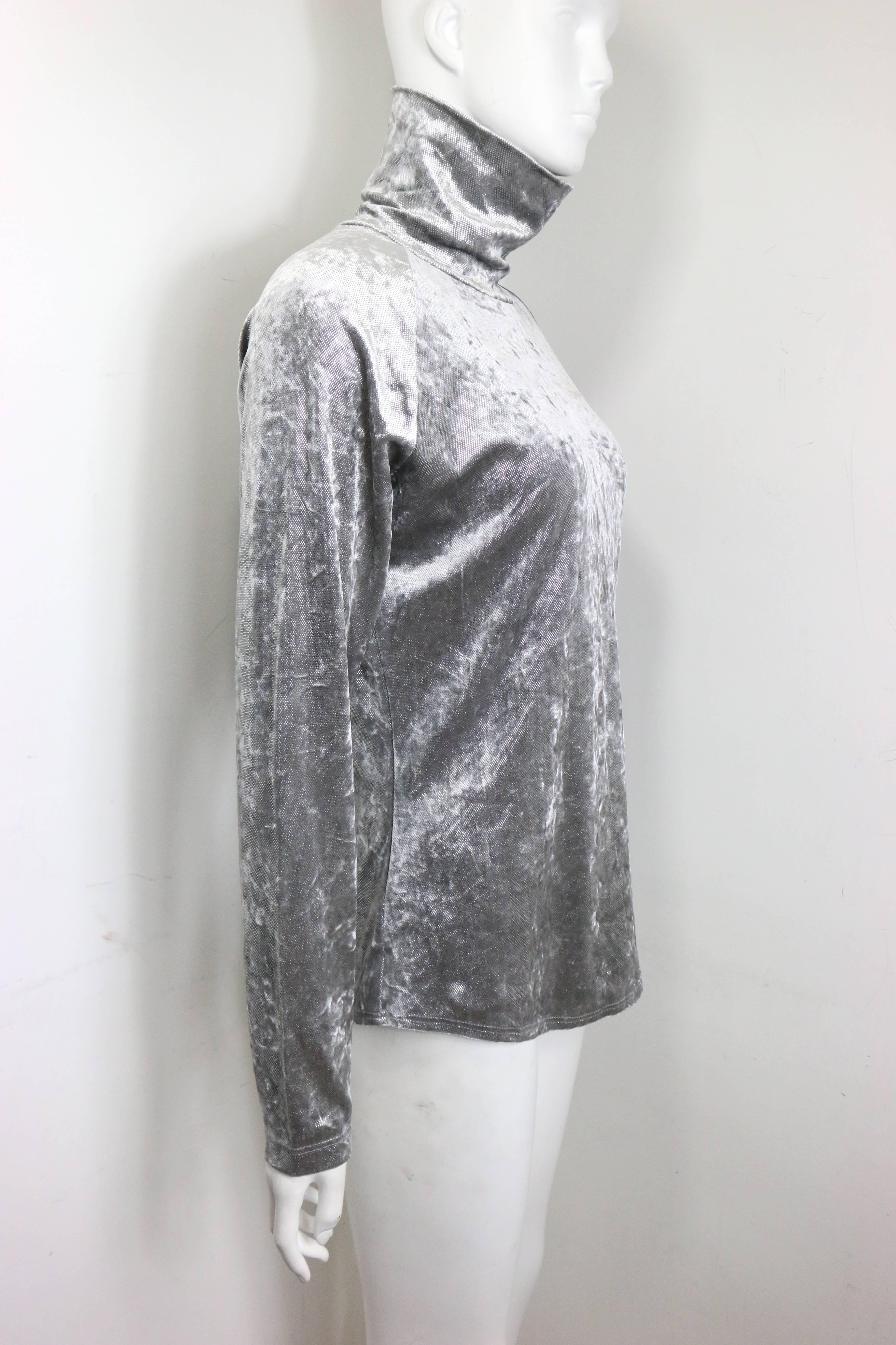 - Vintage 90s Paco Rabanne silver shiny and glitter pullover turtleneck top. 

- Made in France. 

- Size L. 

- 77% Acetate, 14% Nylon, 9% Elastane. 

