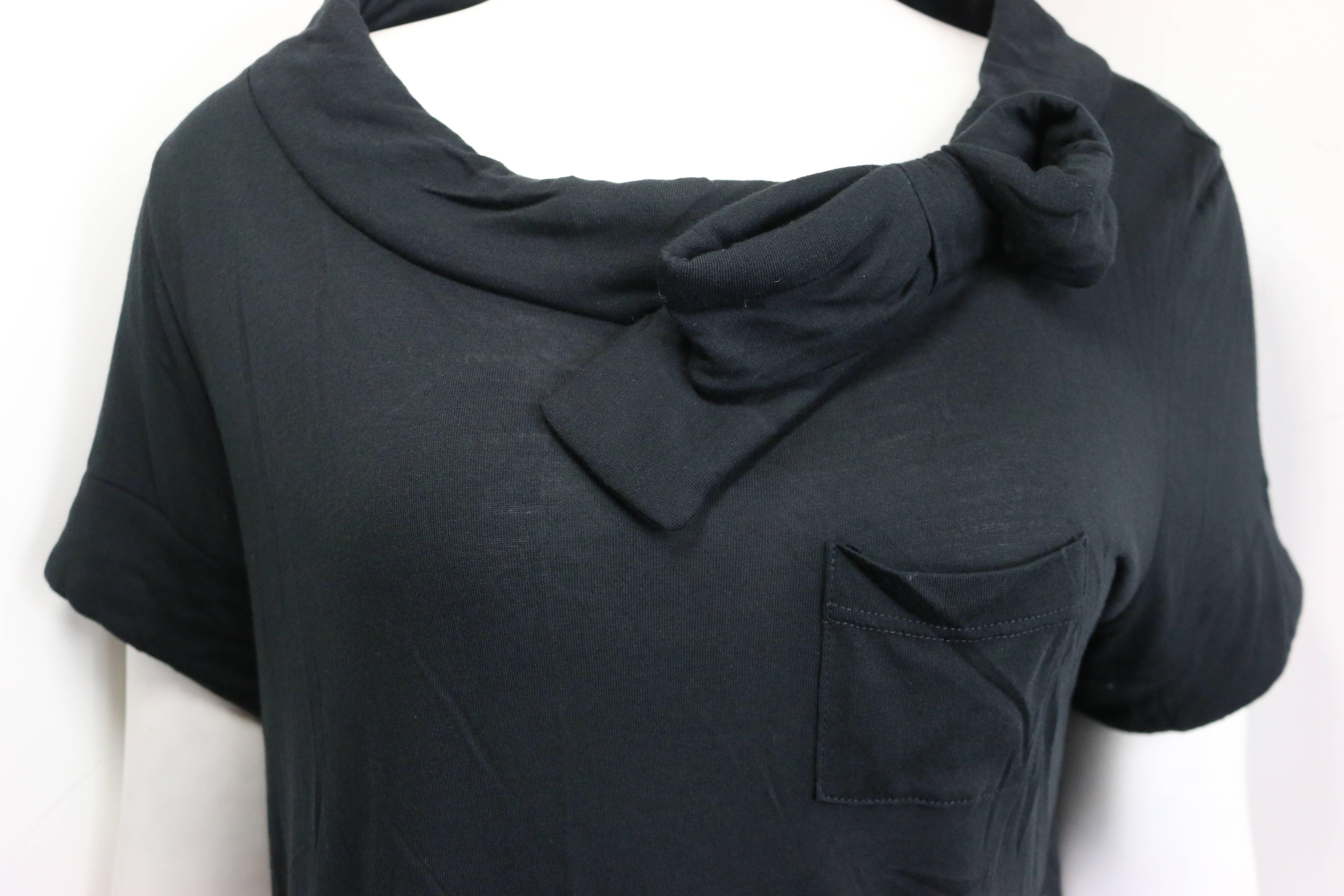 - Red Valentino black cotton with bow on the collar short sleeves scoop neck t shirt. Featuring a small pocket in front. It comes with original tag that has never been worn before. 

- Made in Italy. 

- Size XL. 

- 100% Modal. 