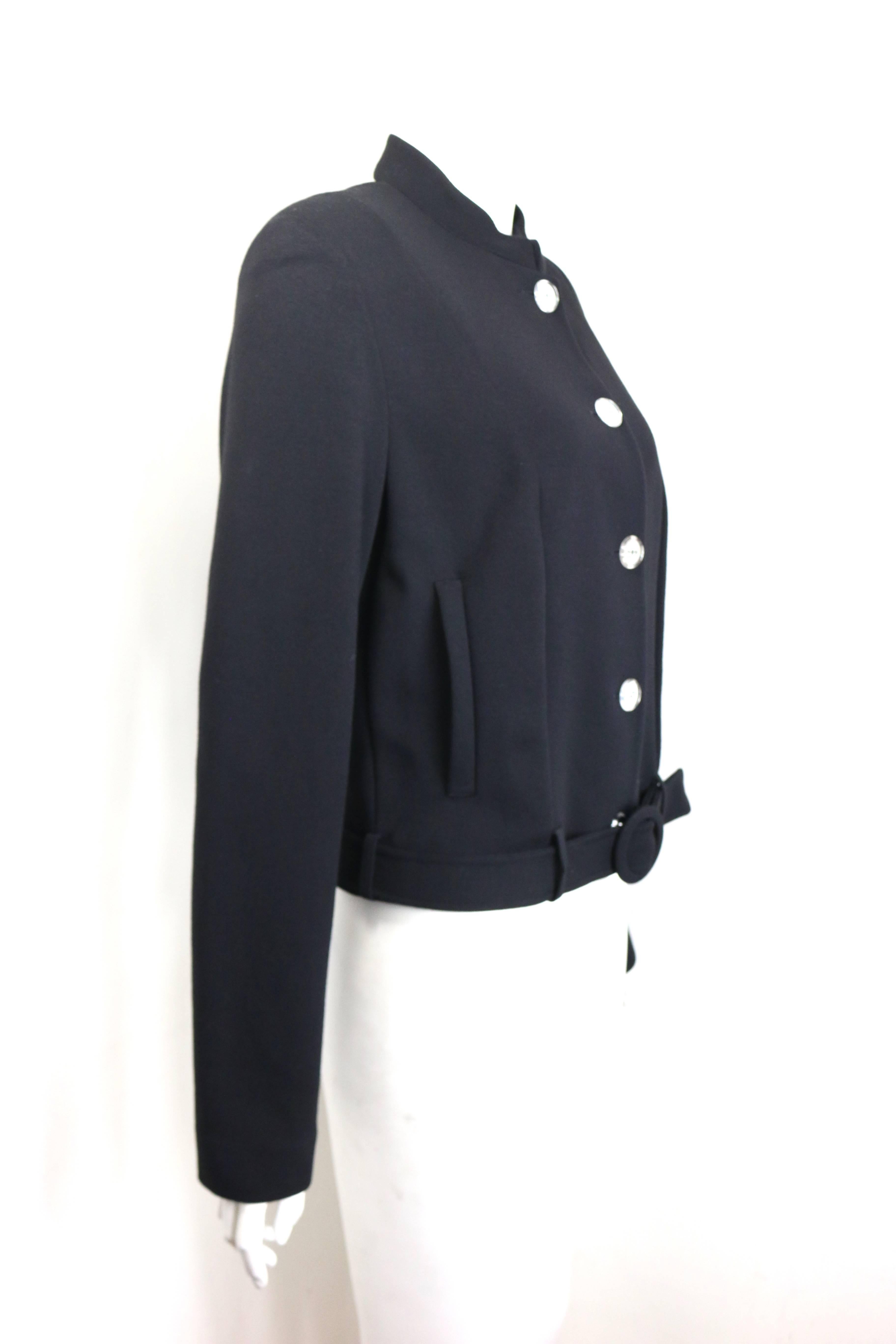 - Vintage 90s Dorothee Bis black cropped jacket 

- Mandarin collar. 

- Five mirror buttons closure. 

- One black belt closure. 

- Shoulder: 14 inches. Bust: 30 inches. Length: 20 inches. Sleeve: 25 inches each. 

- Size 40 FR, US 12. 

- 75%