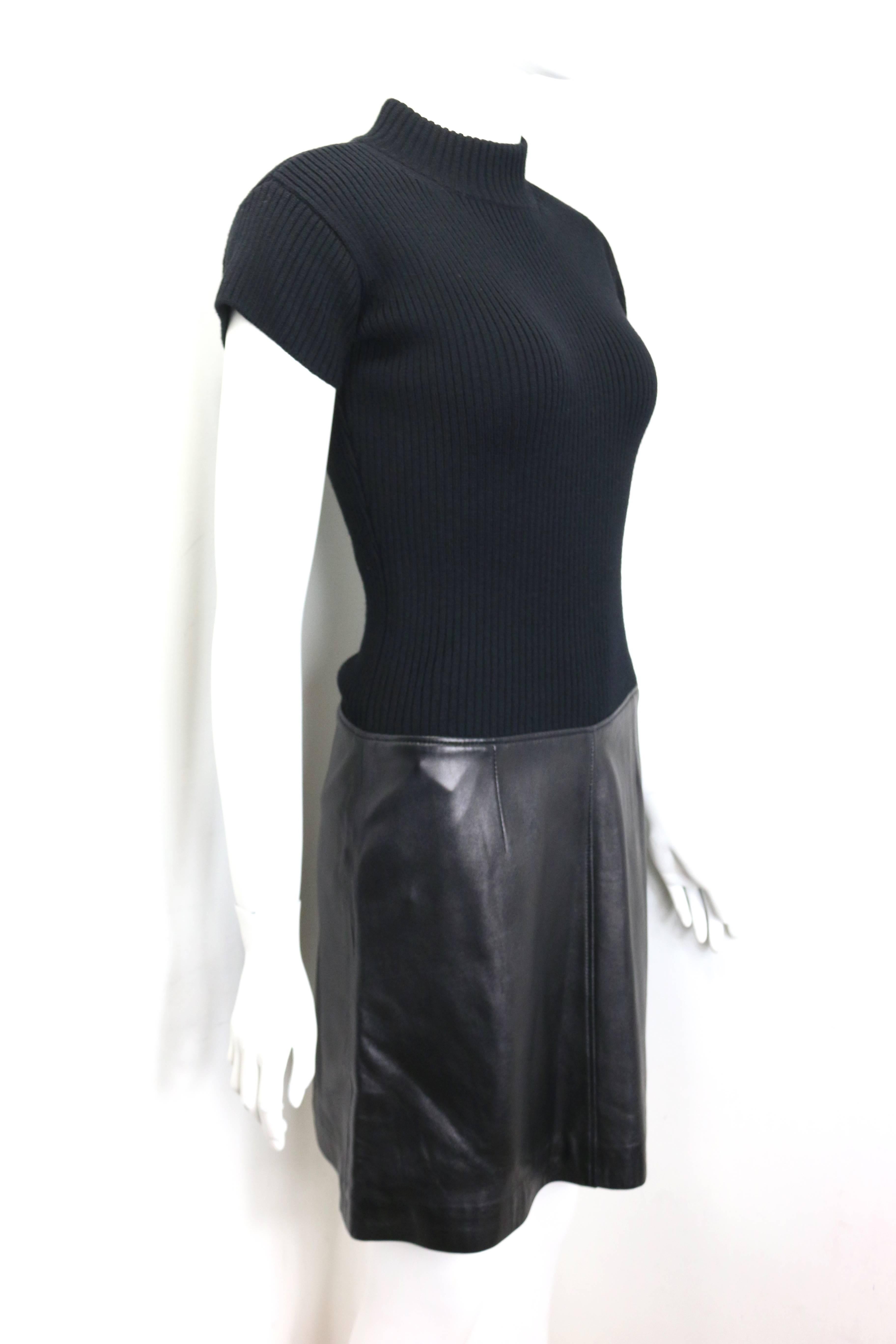 - Vintage 90s Anteprima black wool and lambskin leather short sleeves dress. 

- Side zip closure. 

- Size M. 

- Shoulder: 16 inches. Bust: 30 inches. Height: 36 inches. 

- 100% Wool, 100% Lambskin Leather. 

