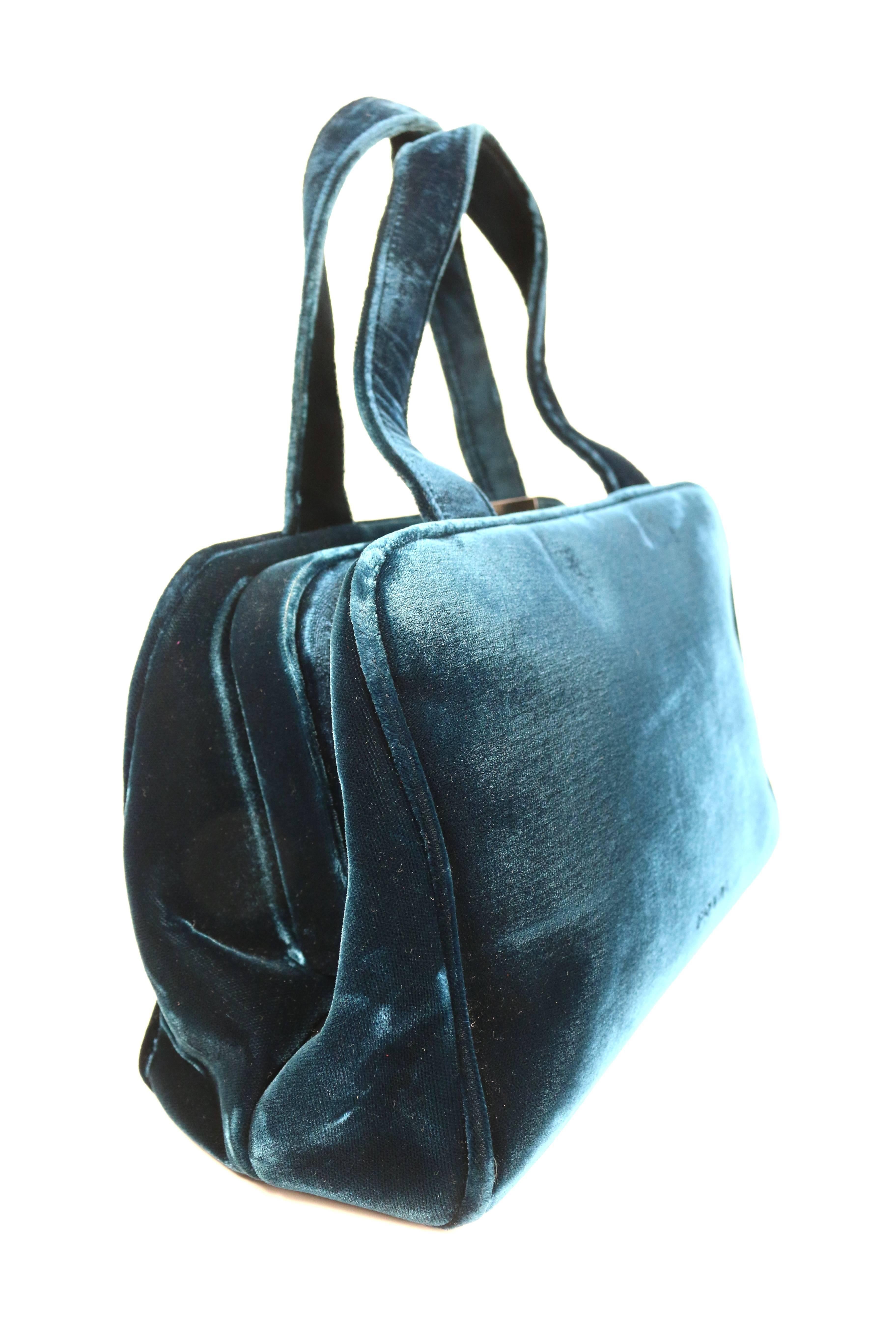 - Vintage 90s Prada blue velvet handbag. 

- Rectangle shape. 

- 