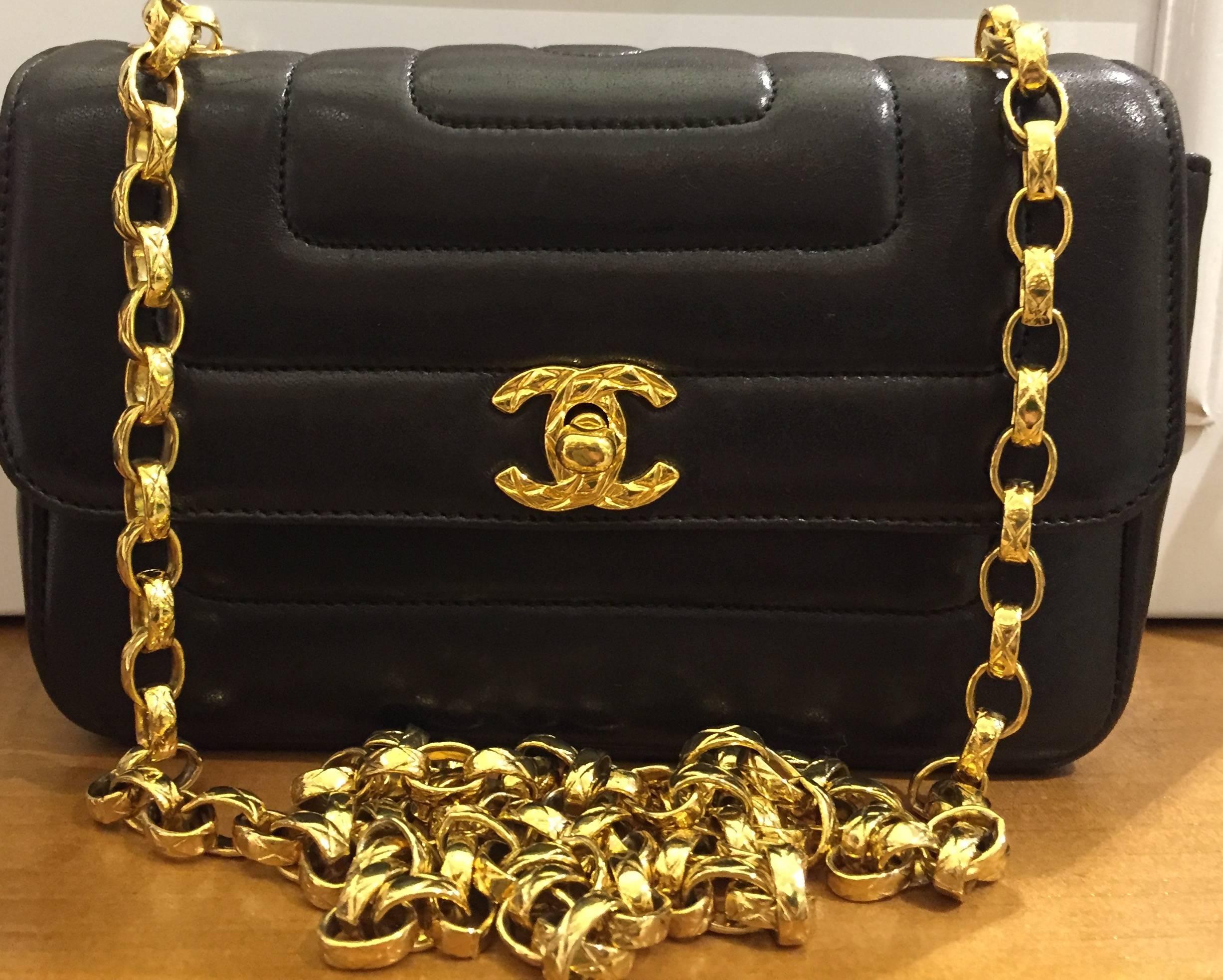 - Vintage 90s Chanel black lambskin leather Diana shoulder bag. 

- Gold toned 