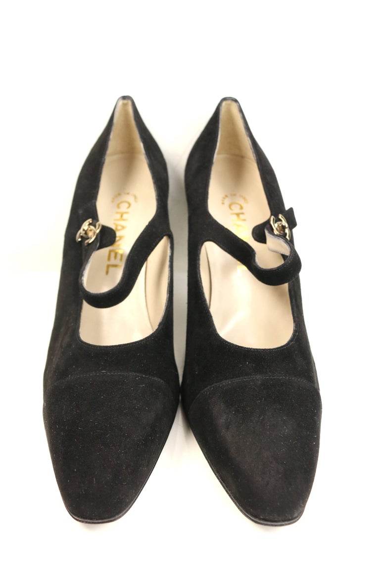 - Vintage 90s Chanel classic black suede pointy pumps. 

- Decorative silver toned 