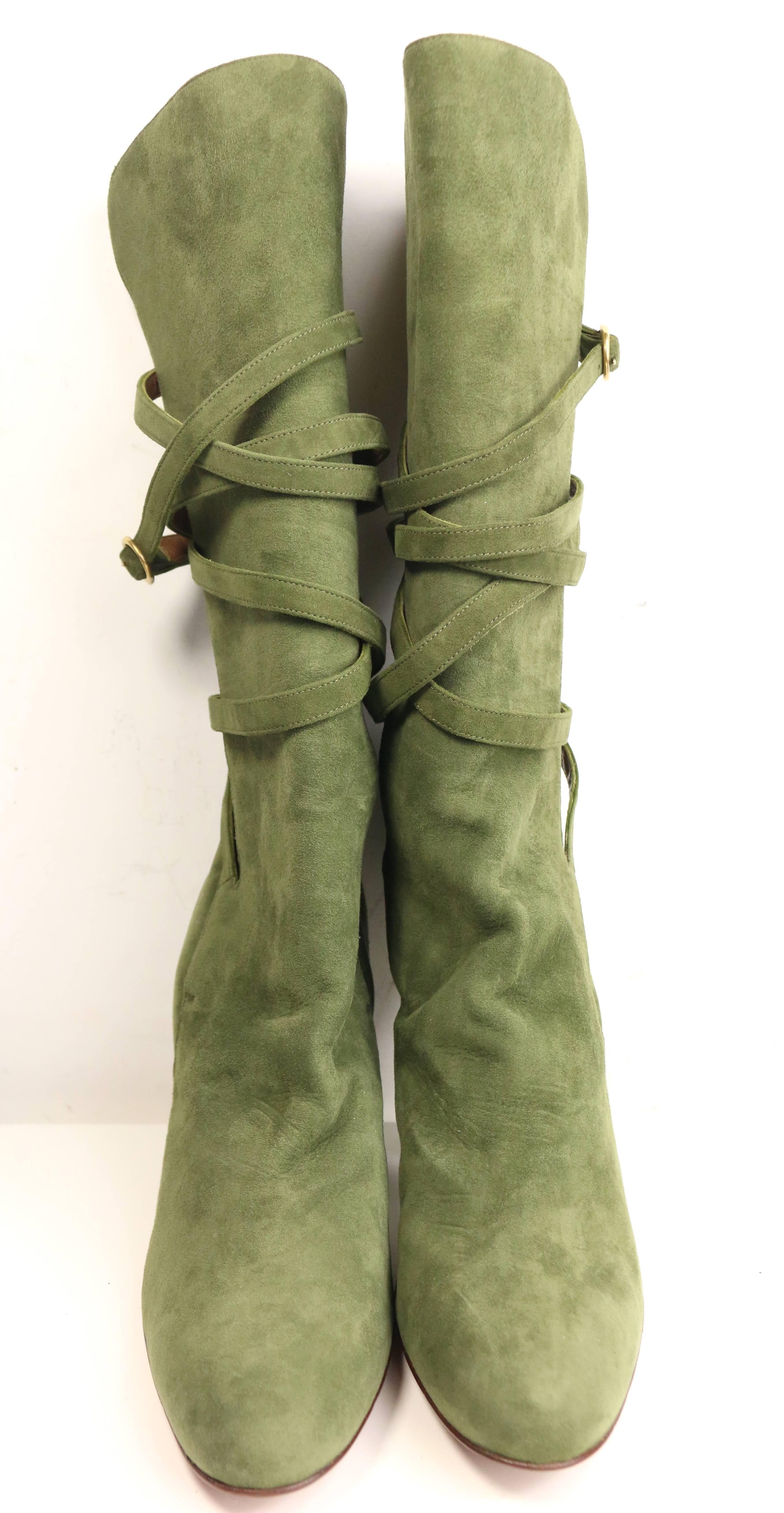 - YSL green suede lace up boots. 

- Wrap around lace up with a gold buckle fastening. 

- Size 38.5 

- Brand new that it has never been worn before. 