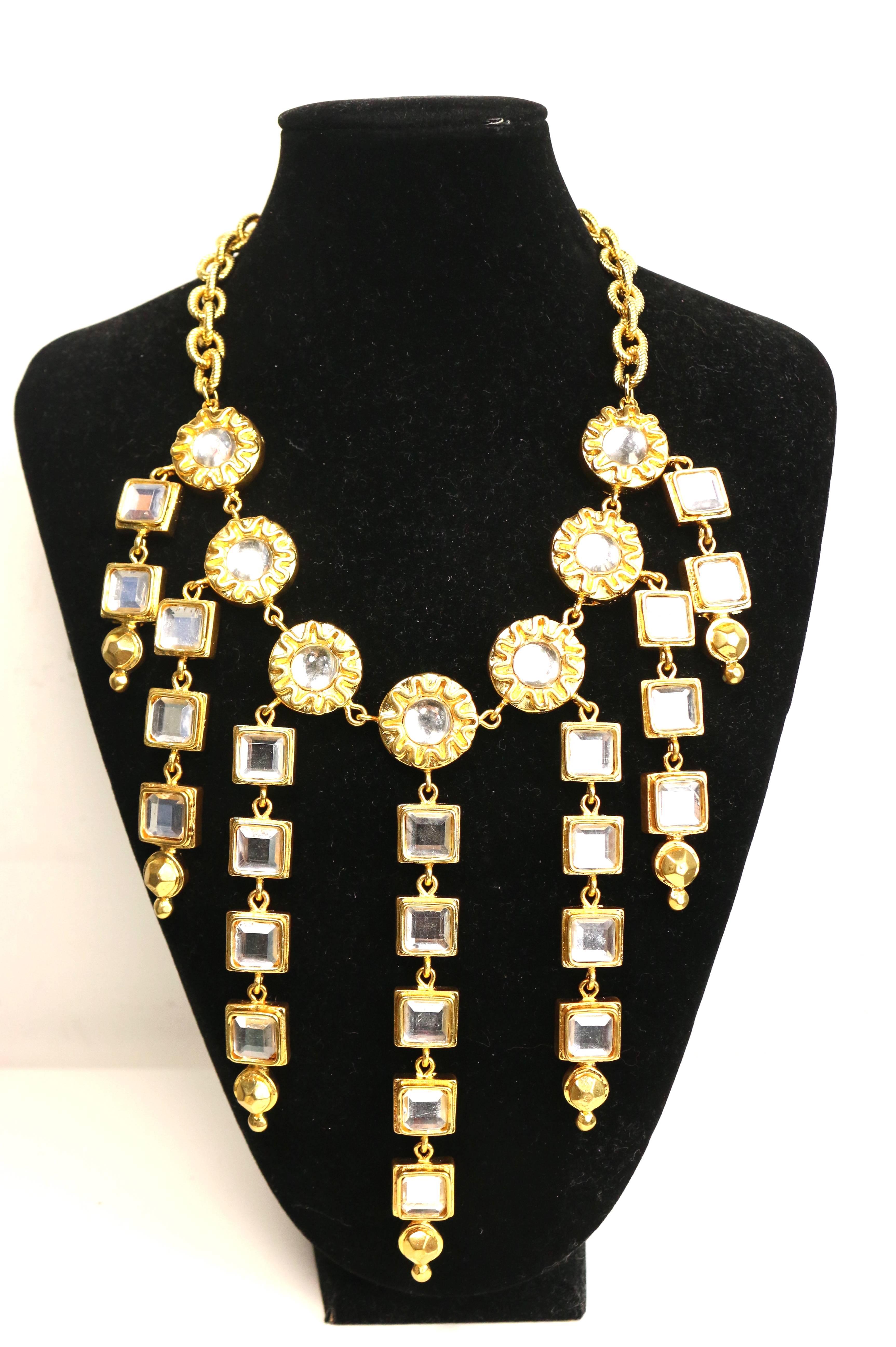 - Vintage 80s Escada gold toned setting rhinestones statement necklace. 

- Featuring round gold toned setting rhinestones attached to few drops square gold toned setting rhinestones. 

- Gold toned hook closure. 

- Height: 15 inches. Width of the