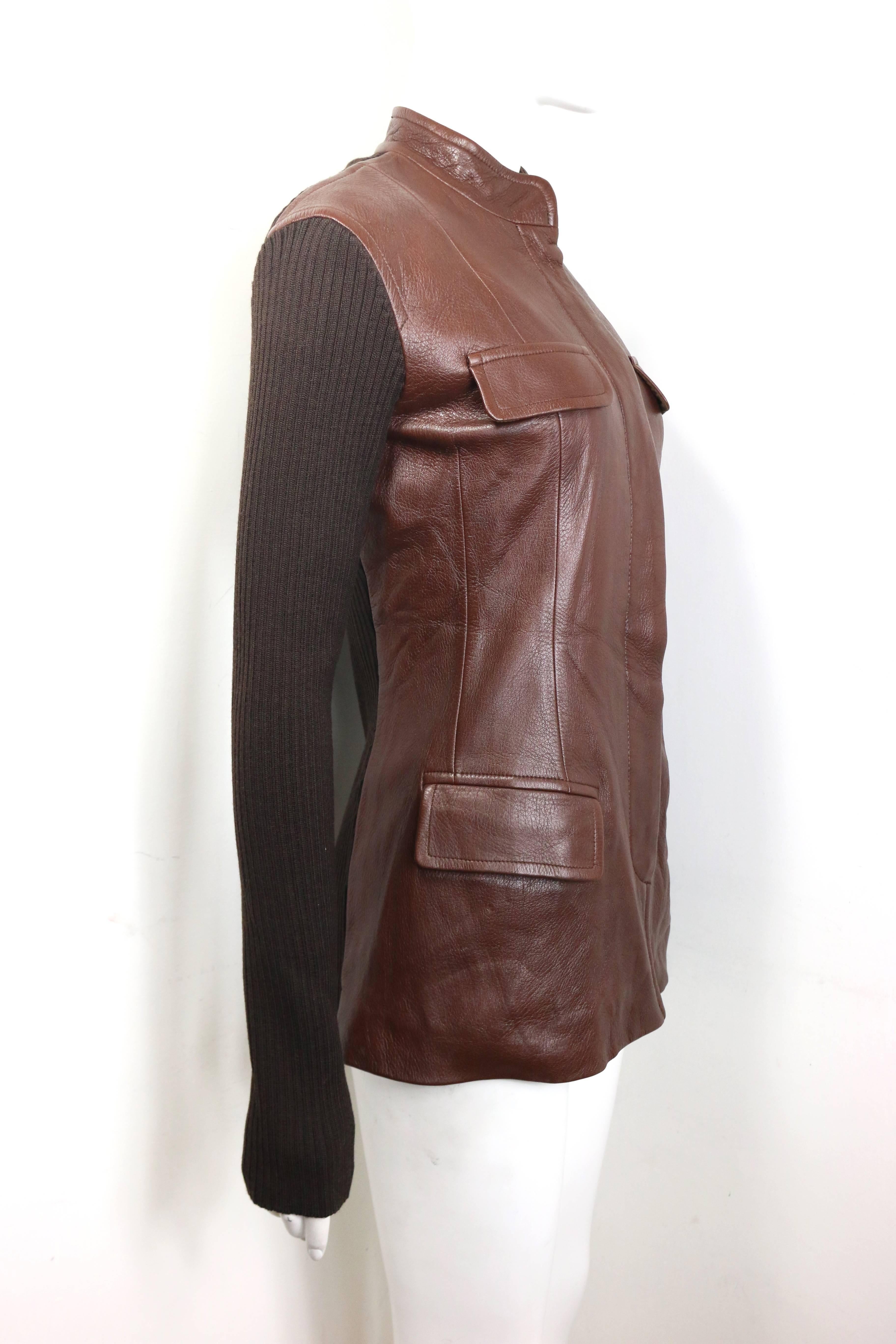 - Vintage 90s Donna Karan brown bi fabric leather and knitted wool sleeves jacket. 

- Featuring a mandarin collar and buttons closure. 

- Two decorative flaps on the bust area. 

- Two flap pockets. 

- Size M. 

- 100% Leather and Merino Wool.