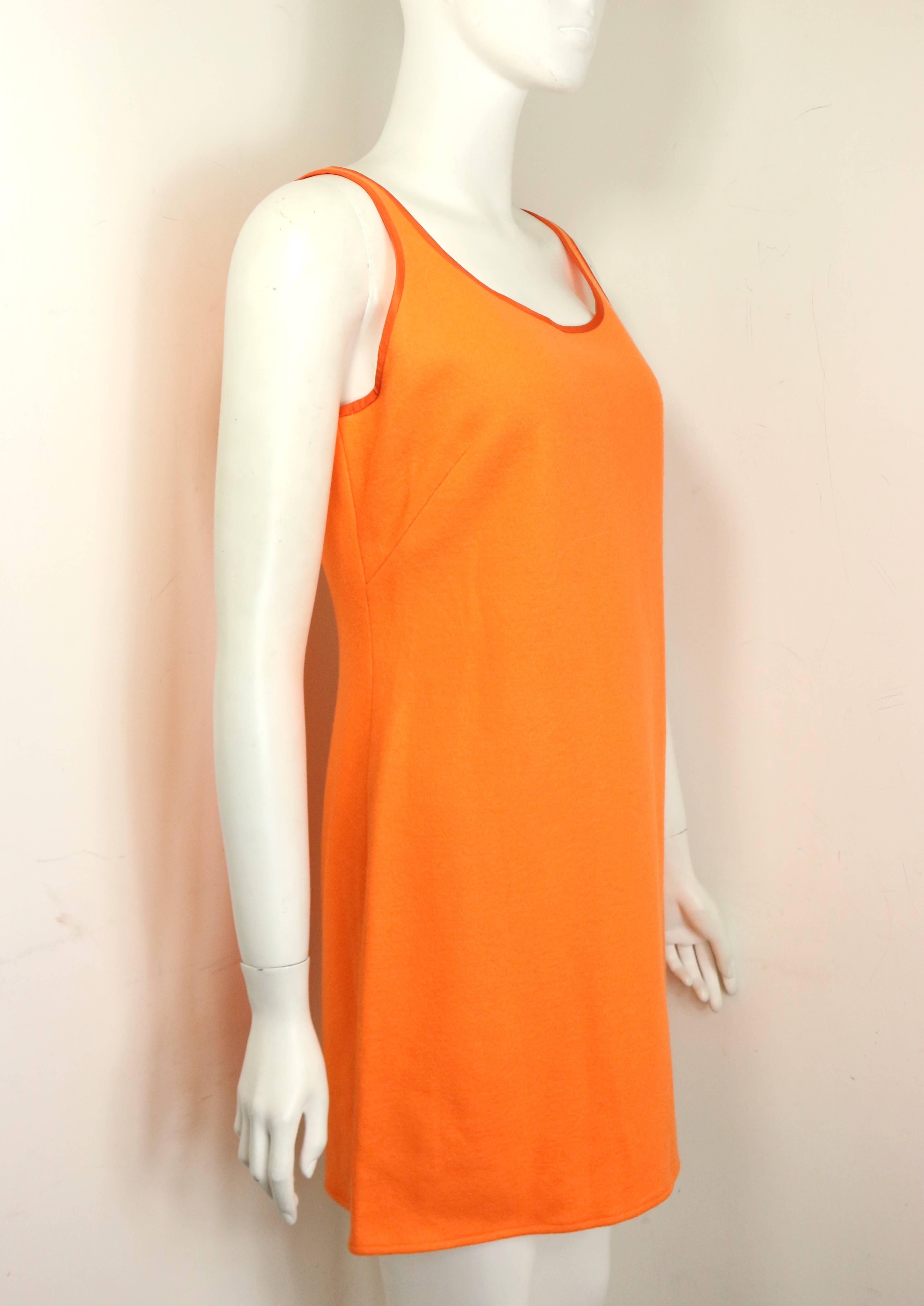 - Vintage 90s Rebecca Moses orange wool sleeveless dress. 

- Featuring round neck with silk trim. 

- A line cutting. 

- Back zip closure with a hook fastening. 

- Size 42. 

- 100% Wool. 