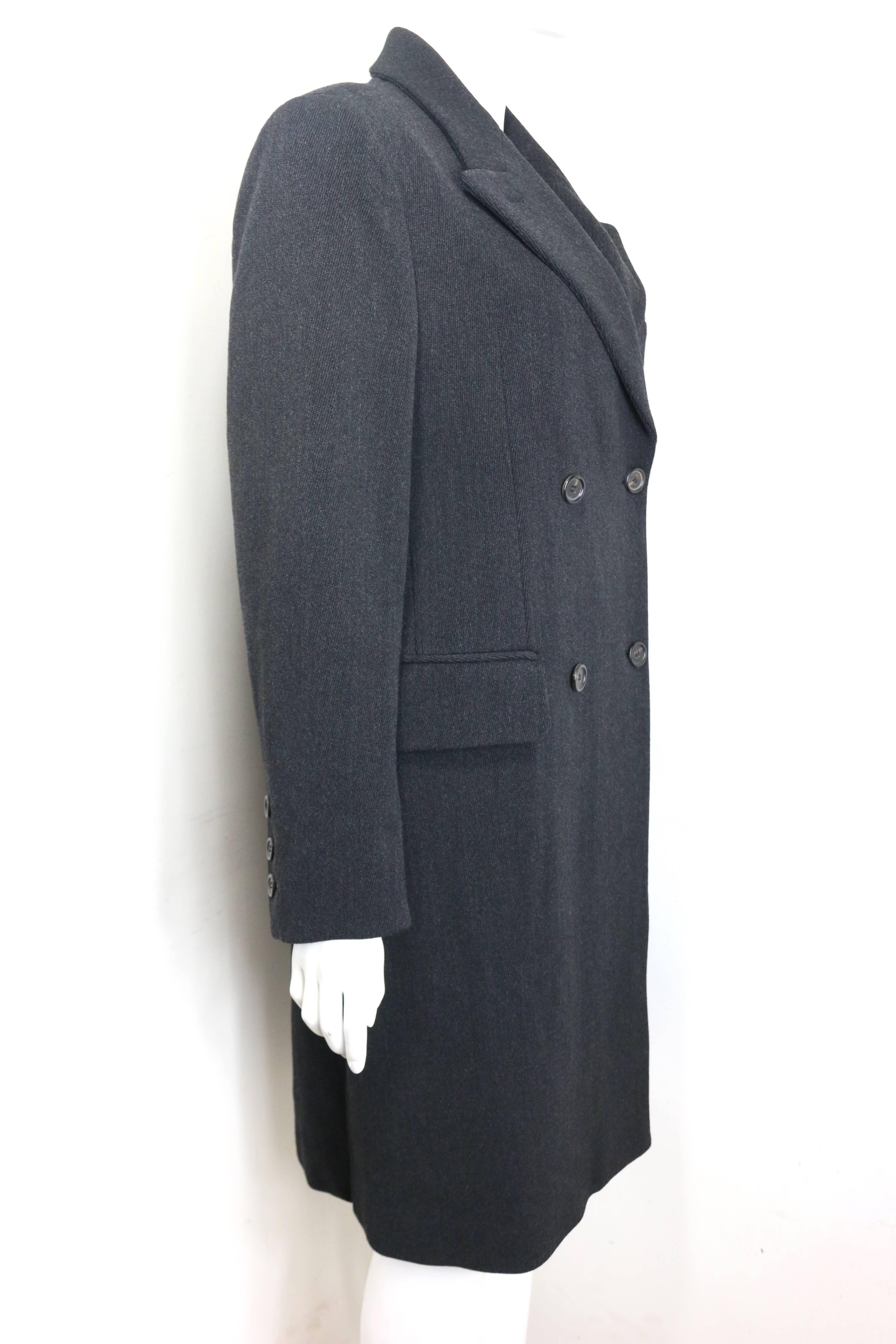 - Vintage 90s Prada grey wool double breasted long coat. 

- Two flap pocket. 

- Back Vent. 

- Size 42. 

- 100% Wool, Lining: 100% Rayon. 

- Never been worn before attached with original tag. 

