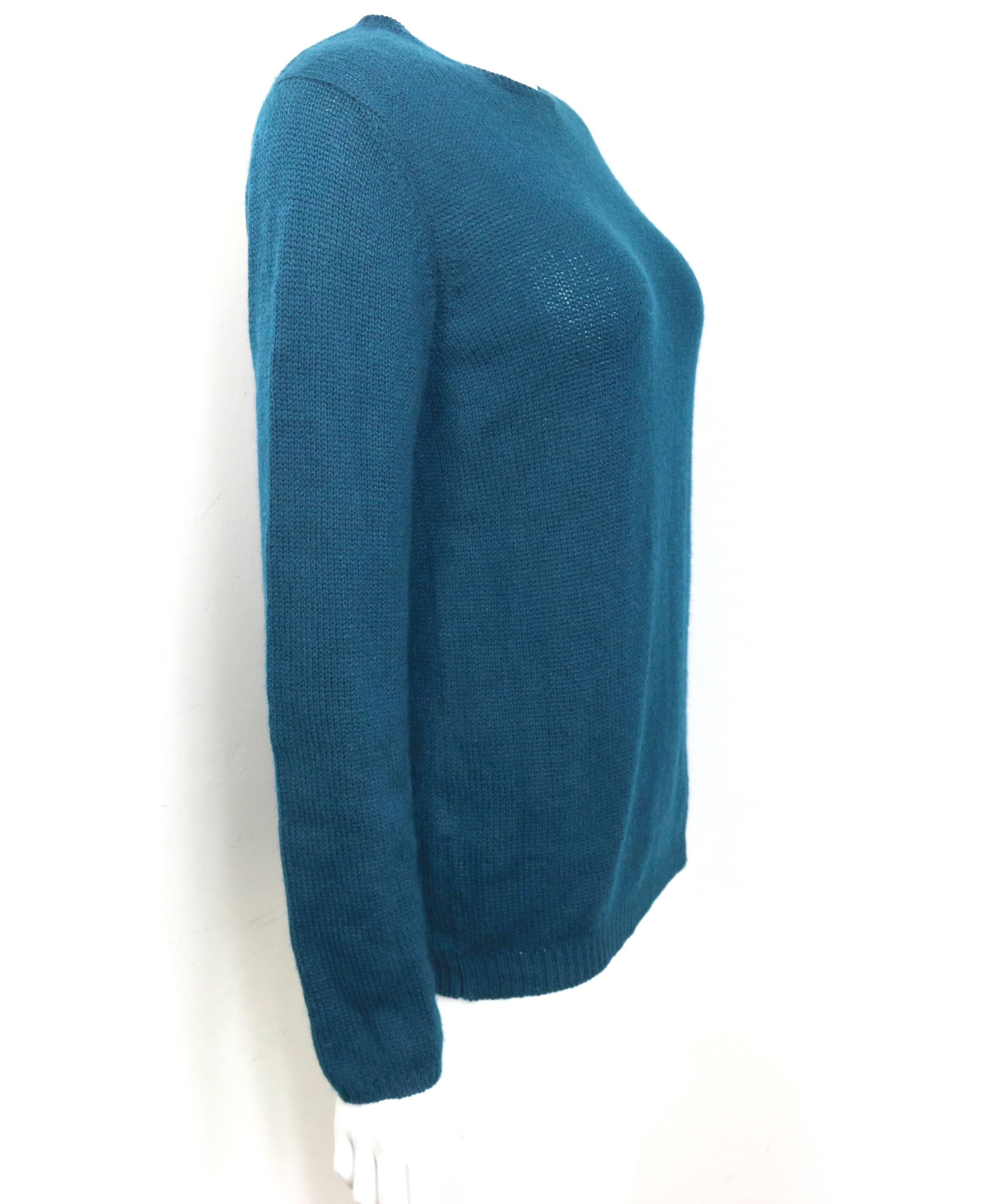 - Vintage 90s Prada teal cashmere pulllover sweater. 

- Size 46. 

- 100% Cashmere