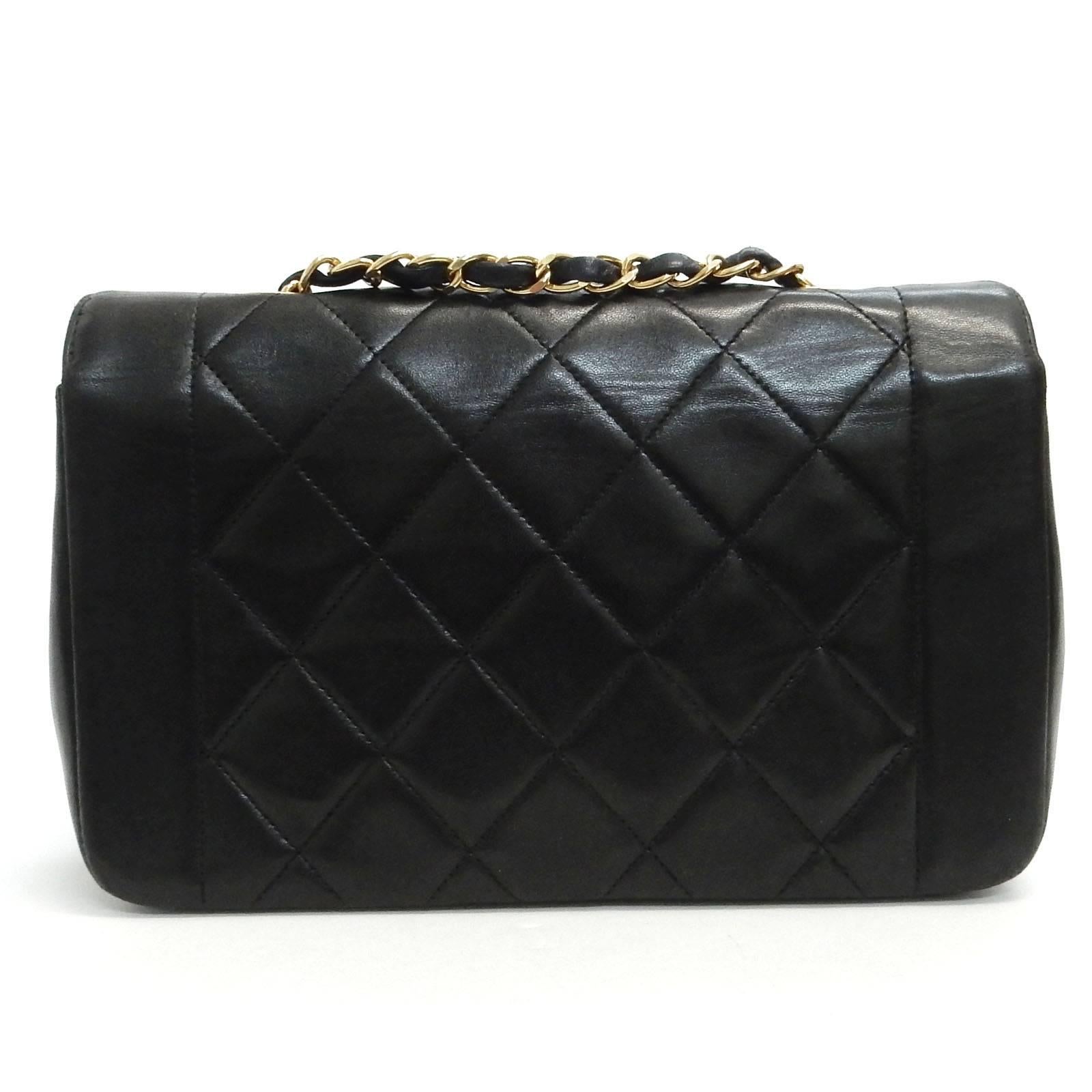 - Vintage 1996 to 1997 Chanel "Diana" black quilted lambskin leather with gold chain leather strap shoulder bag. One of the famous bag and the size is small. 

- A flap with gold-toned hardware "CC" turn lock closure. 

-