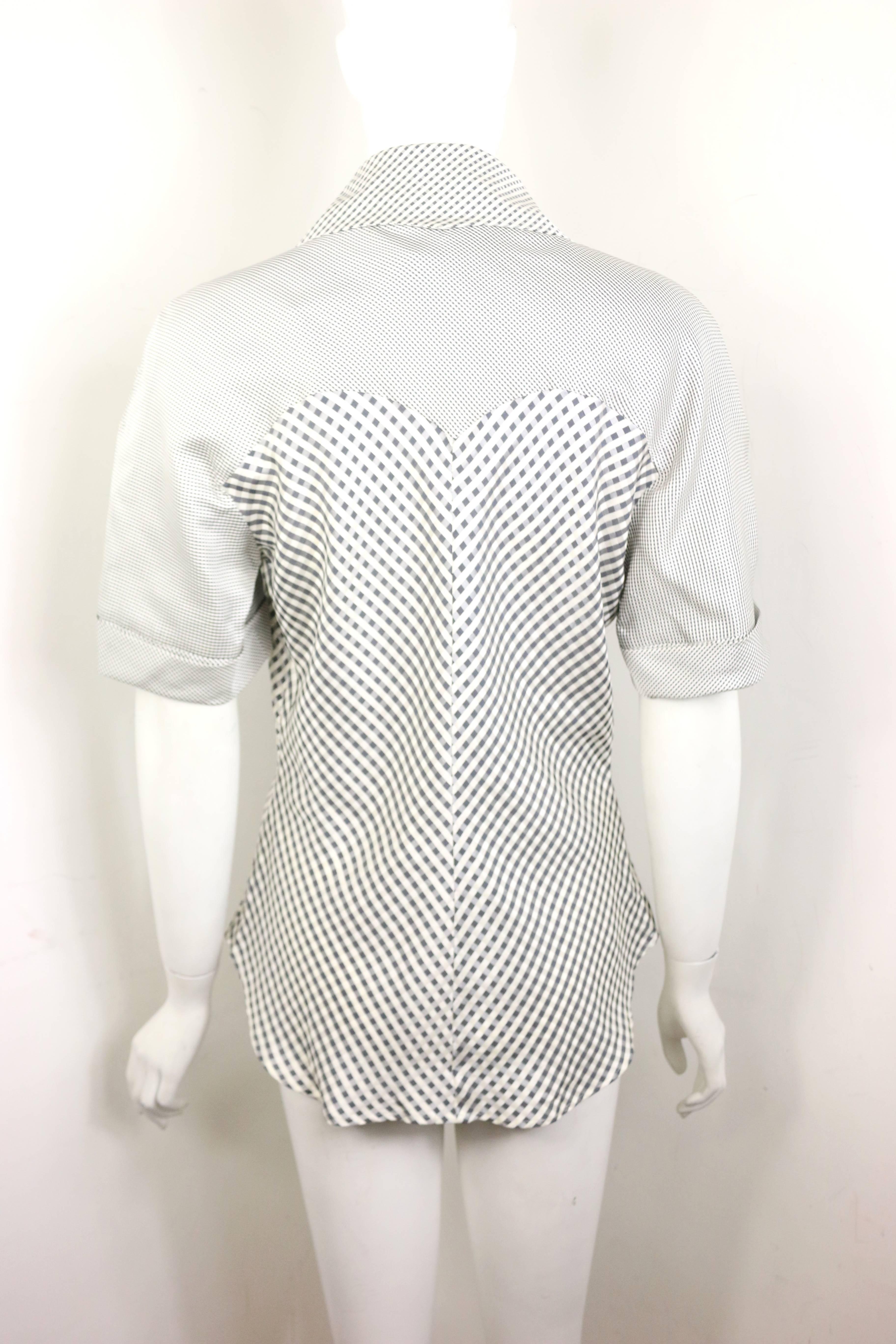 - Vintage 90s Givenchy Couture by Alexander McQueen black and white silk check pattern short sleeves blouse. 

- Featuring round shoulder with big pointy V-neck collar. 

- The hem is curvy at the front and it is slightly shorter than the back. 

-