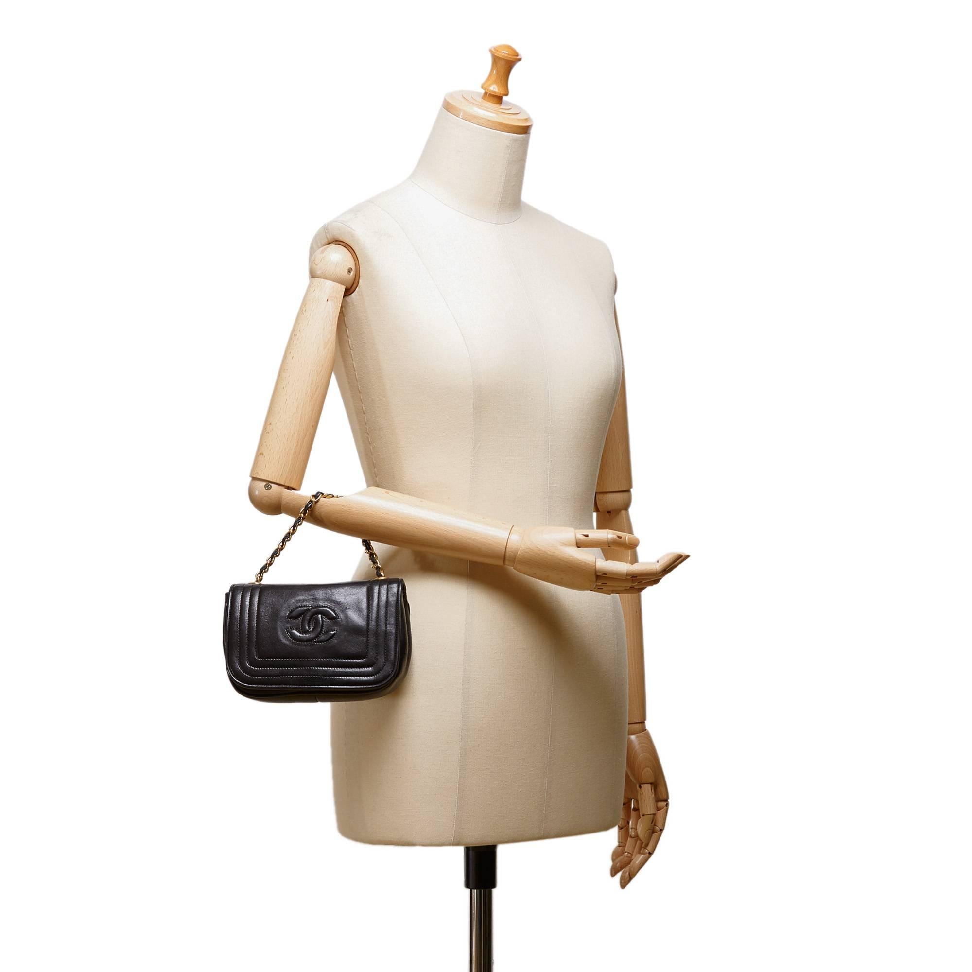 - Vintage 90s Chanel black lambskin straight stitch details gold chain bag. 

- A 