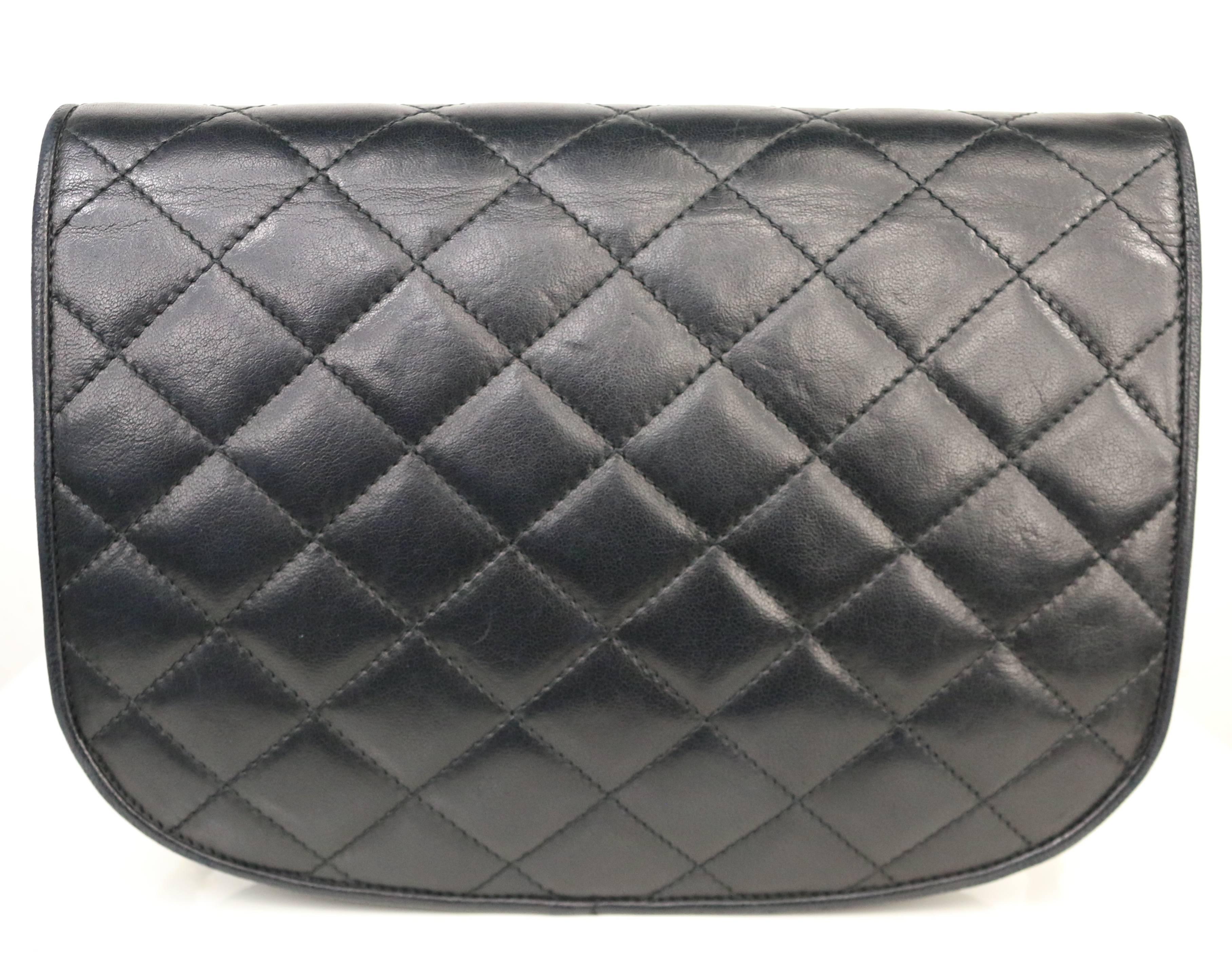 - Vintage 1989 to 1991 Chanel semi circle black quilted lambskin leather shoulder bag. This bag is Paris limited edition that is really rare!

- Featuring a silver-toned and gold-toned hardware 