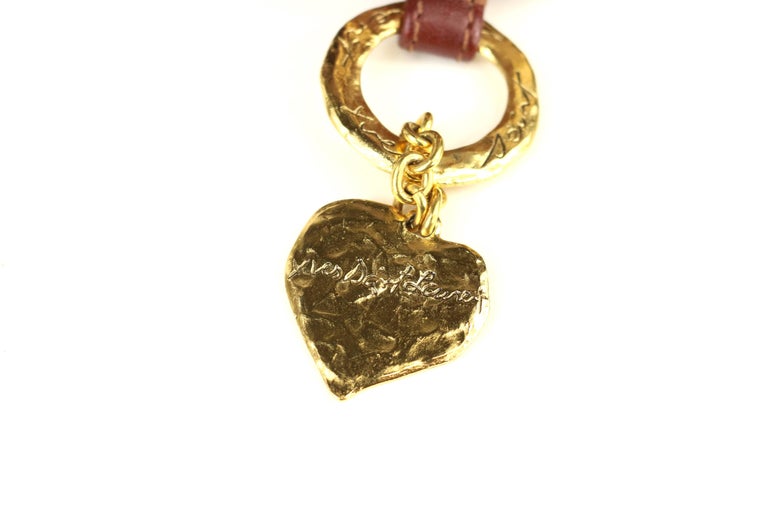 Yves Saint Laurent Brown Leather Gold Toned Studs with Gold  display picture 2