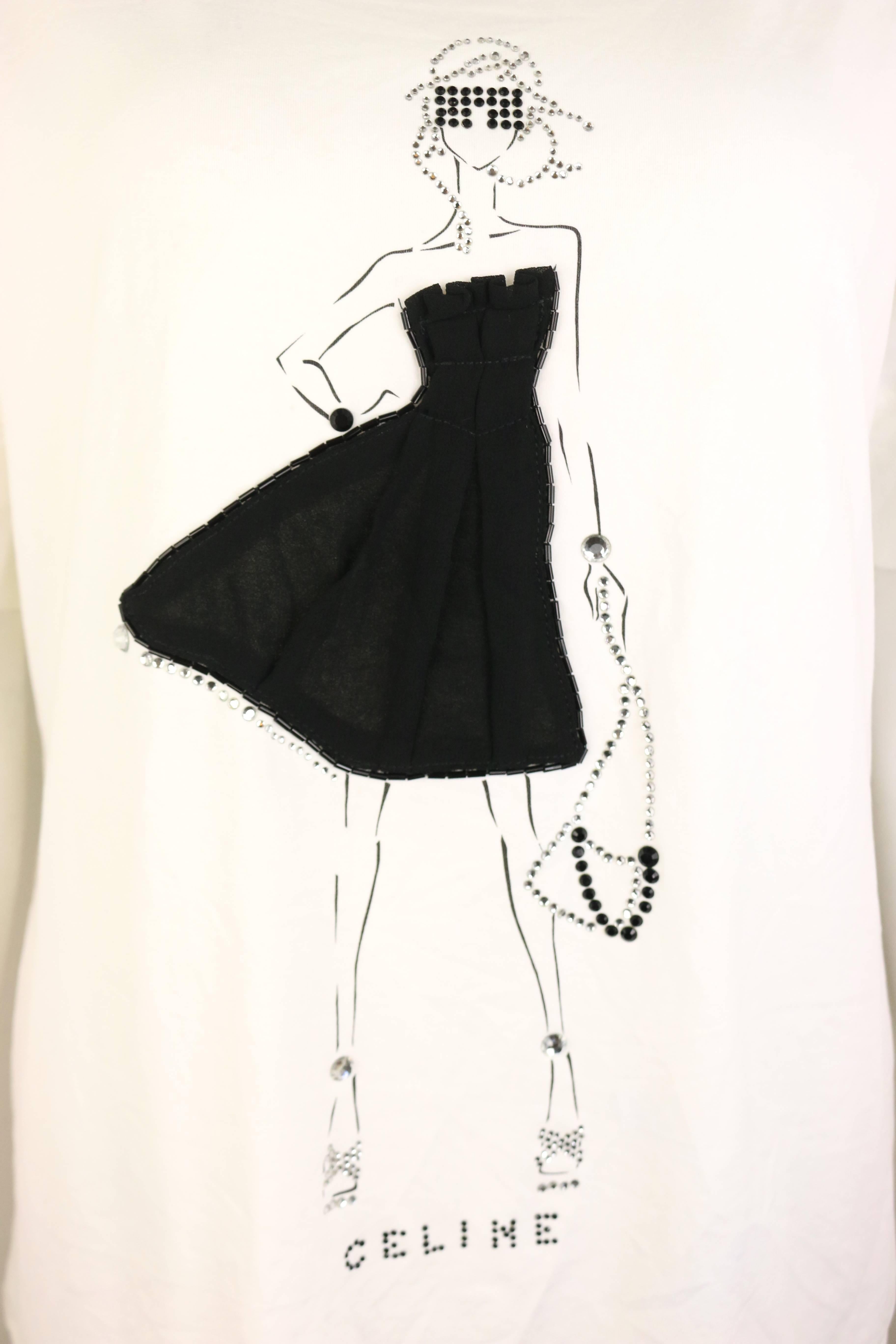 - Celine white with black/silver rhinestones girl print cotton t-shirt. 

- Featuring the girl print wears a black tube top fabric dress with black beads and silver rhinestones accessories outline. 

- Size XL. 

- 90% Cotton, 10% Elastane. 