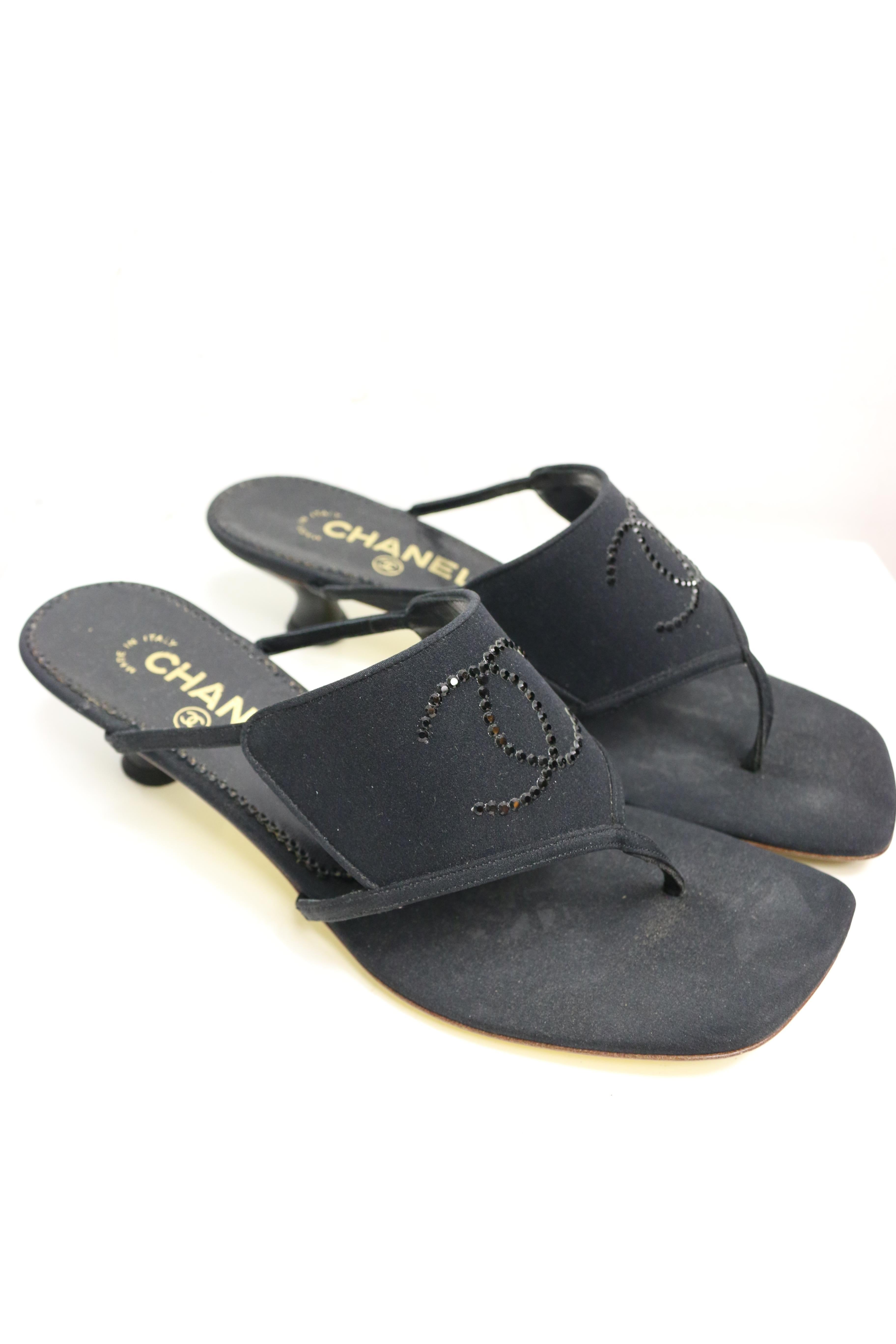 - Vintage 90s Chanel black silk sandals. 

- Featuring black 