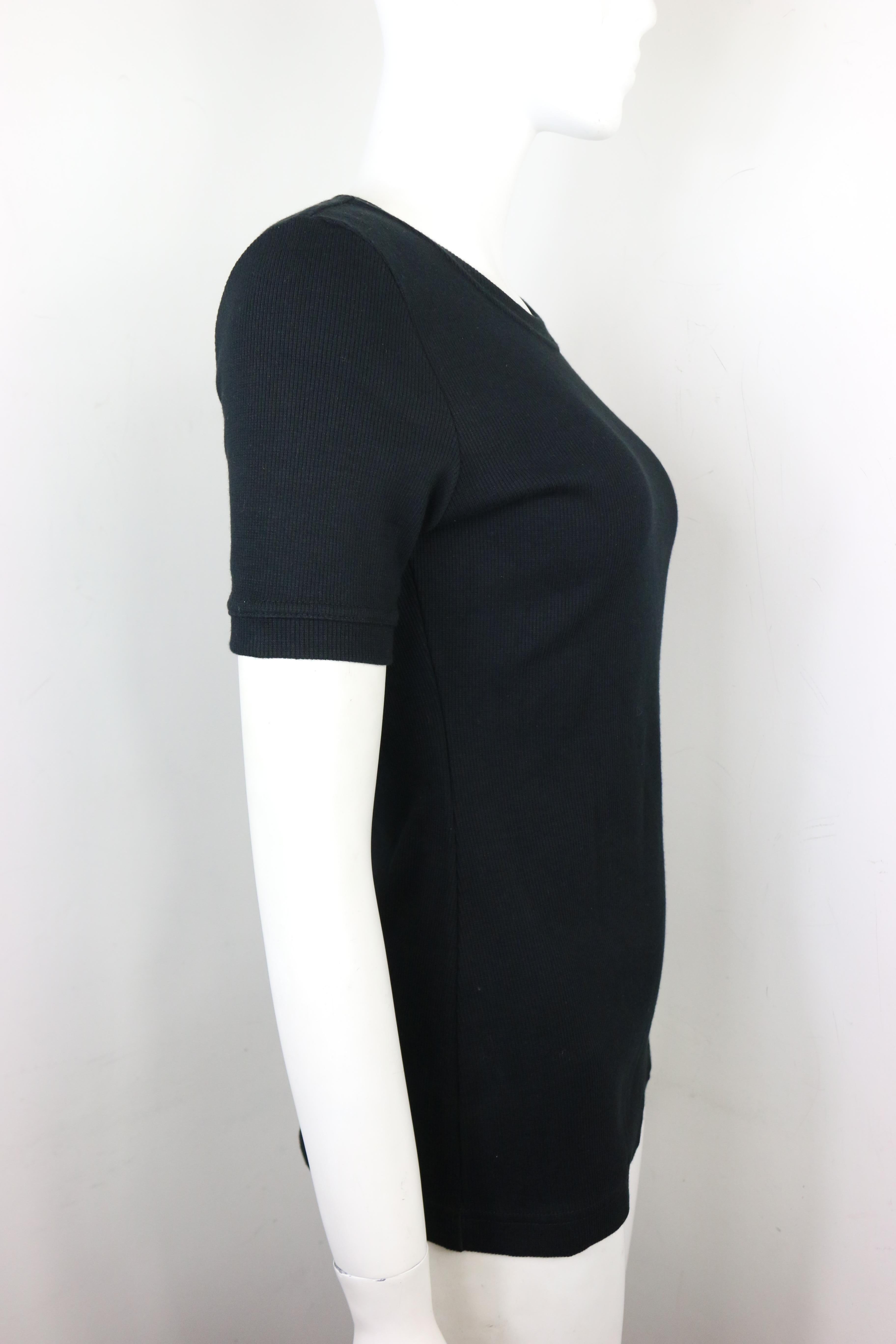 - Vintage Tom Ford for Gucci thick cotton black short sleeves top from 1996 spring collection. 

- Featuring Gucci label on the left sleeve. 

- Ribbed neck, sleeves, and hem. 

- Size L. 

- 85% Cotton, 15% Spandex. 

- Unworn with original tag. 
