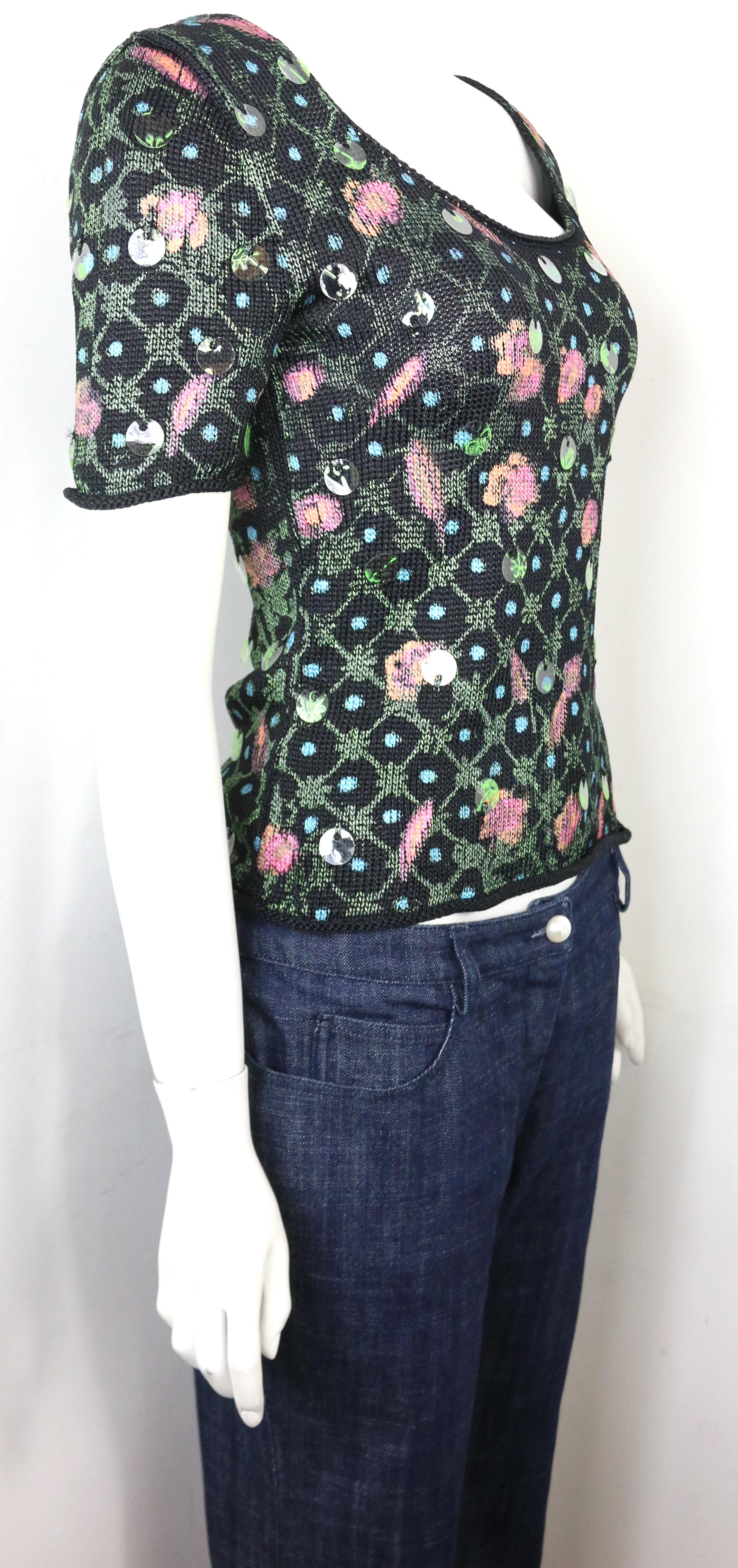 - VIntage 1995 Christian Lacroix black knitted short sleeves top with vinyl sequins. 

- Featuring multi-prints on the knit. 

- SIze M. 

- 100% Rayon.  

- Unworn attached with original tag.