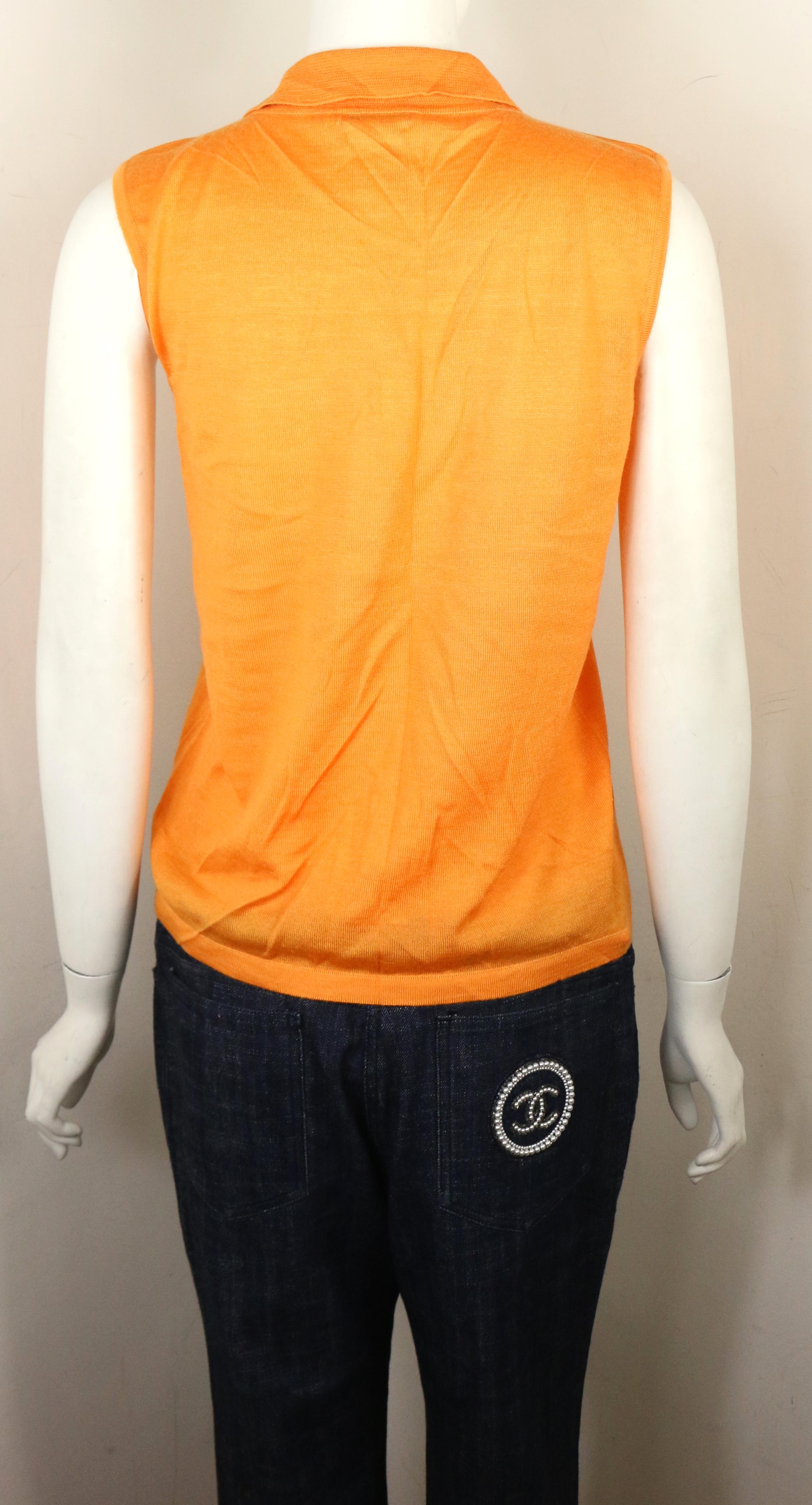 - Chanel orange cashmere and silk sleeveless collar top from the year 2000C collection. 

- SIze 42. 

- 70% Cashmere, 30% Silk. 

