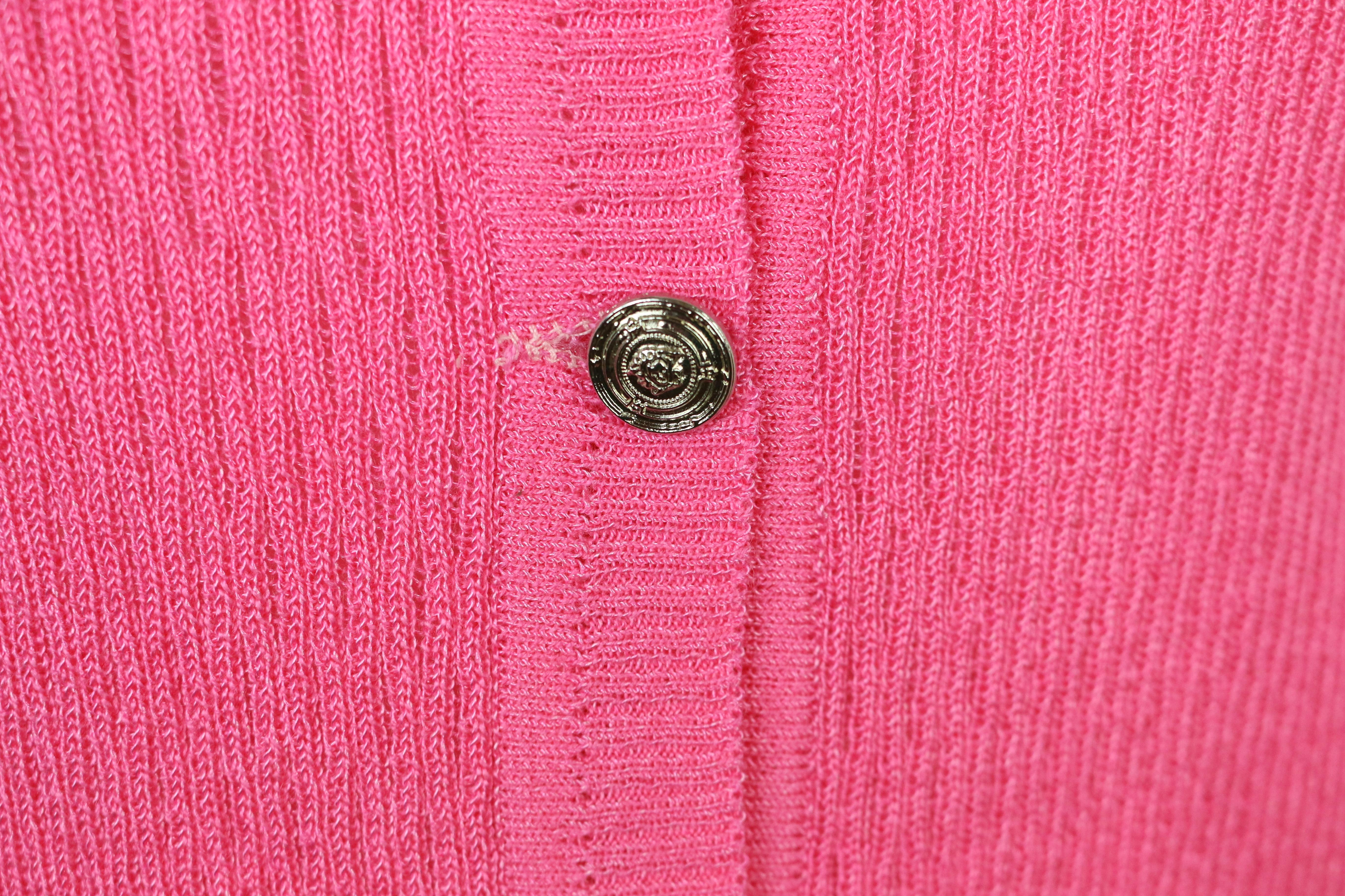 - Vintage 90s Gianni Versace Jeans Couture pink knitted cardigan. 

- Featuring silver-toned 
