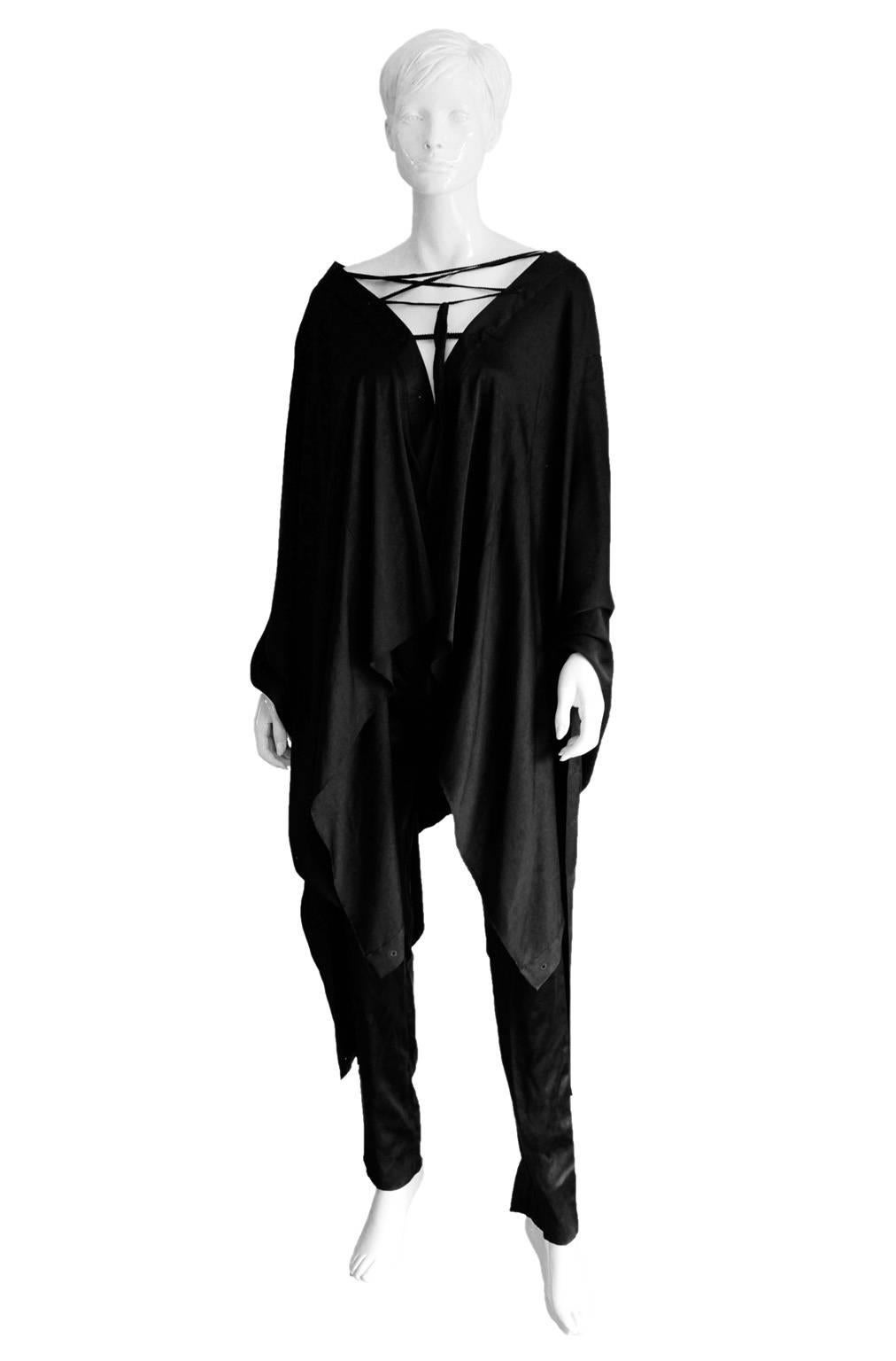 That Amazing Tom Ford For Gucci Fall Winter 2002 Black Silk Gothic Poncho & Pants In Italian Size 42!

This set has only been worn a handful of times & is in very good condition with only minimal signs of wear throughout... an absolute must for
