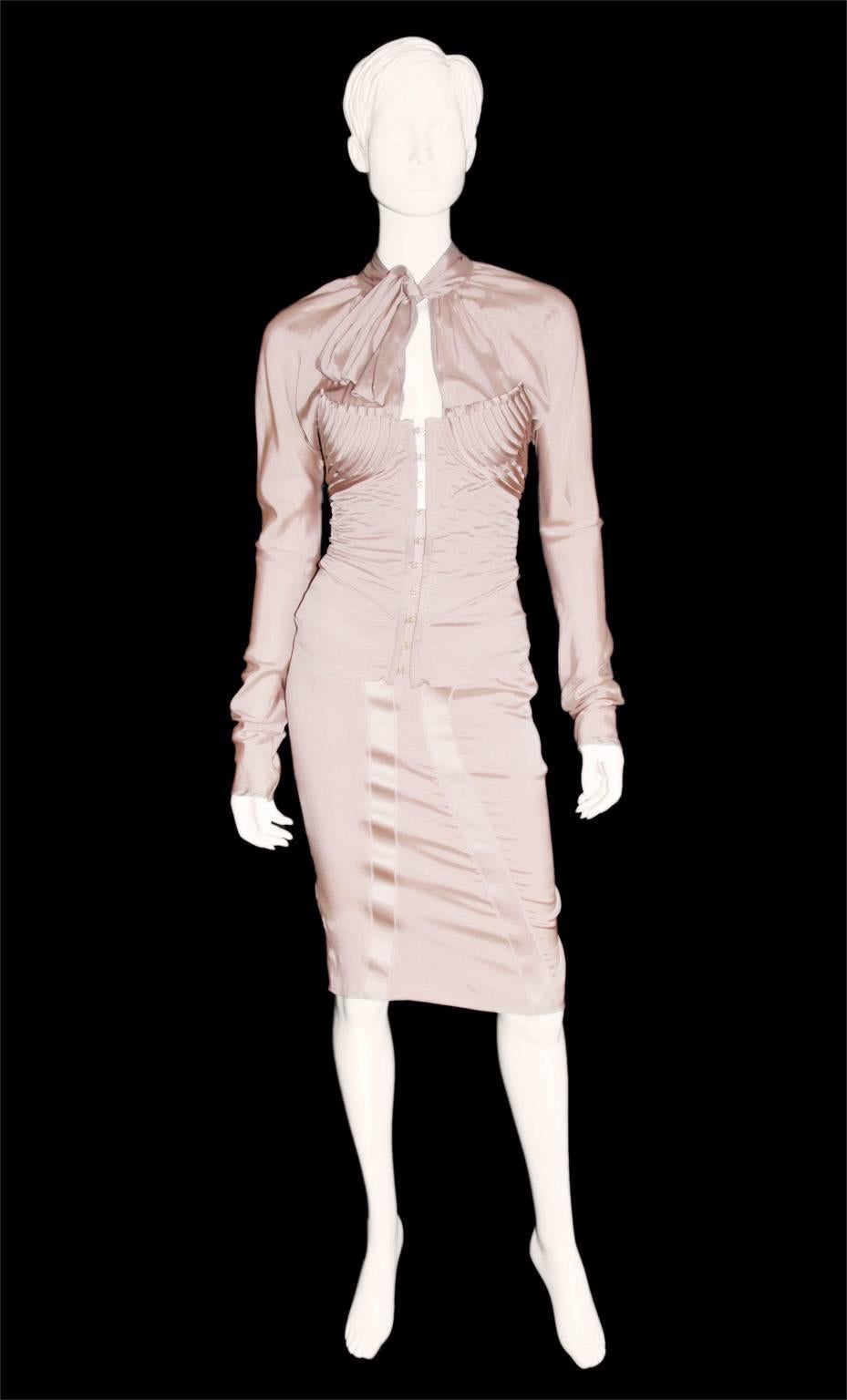 Rare & Iconic Tom Ford For Gucci Fall Winter 2003 Nude Silk Runway & Ad Campaign Corseted Blouse & Skirt Set!

Considered by many to be his greatest collection of all, Tom Ford's fall winter 2003 collection for Gucci was simply awash with the most