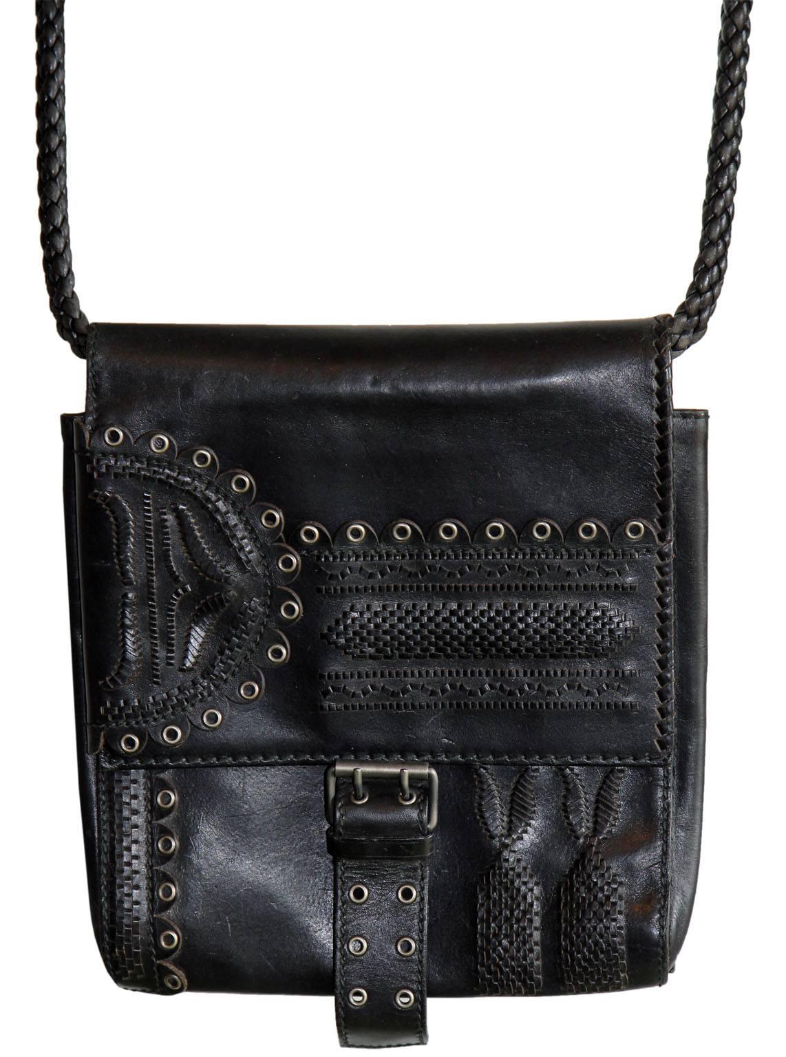 Who could ever forget that Incredible black leather bag from Tom Ford's dreamy fall/winter 2001 collection for Yves Saint Laurent Rive Gauche? This medium/large sized bag is  an absolute Tom Ford masterpiece 
is a must for every Ford lover or