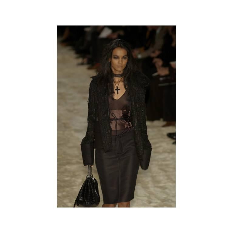 Who could ever forget Tom Ford's fall/winter 2002 Gothic Collection for Gucci... with that dark chinoiseriesque styling & heavenly detailing? Well, this extraordinary belted jacket, surely one of the most memorable Ford pieces of all, was one of