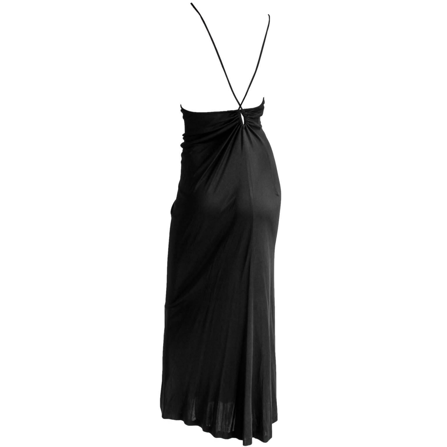 Uber Rare And Iconic Tom Ford For Gucci Spring Summer 1997 Black Backless Maxi Dress!

Who could ever forget Tom Ford's spring summer 1997 collection for Gucci? Well this heavenly maxi dress, surely one of the most memorable Ford pieces of all, was