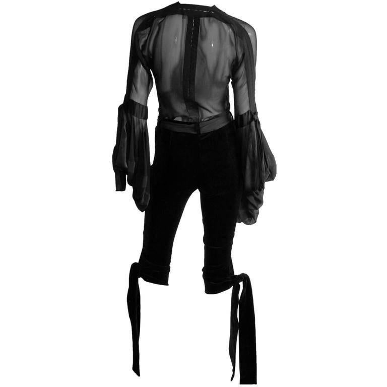Among the most dreamy Tom Ford for YSL pieces of all... those absolutely scrumptious and ridiculously rare Tom Ford for YSL Yves Saint Laurent Rive Gauche Fall Winter 2002 black velvet knickerbocker pants!

The Iconic Collections has been one of the