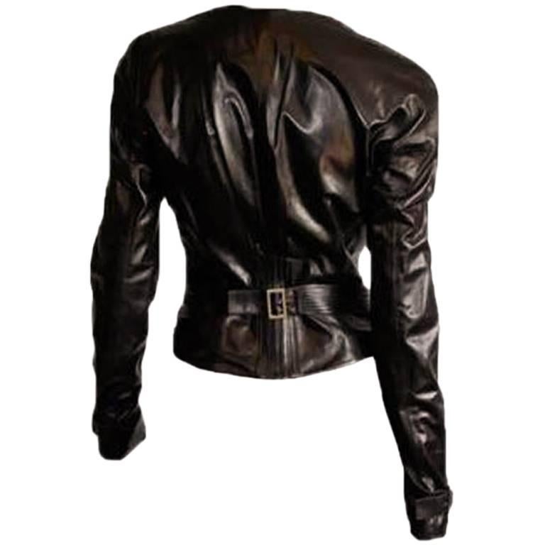 One of the most memorable Tom Ford for Gucci pieces of all... that absolutely gorgeous and extremely rare Tom Ford for Gucci Fall Winter 2003 chocolate brown corseted lambskin leather runway jacket!

The Iconic Collections has been one of the