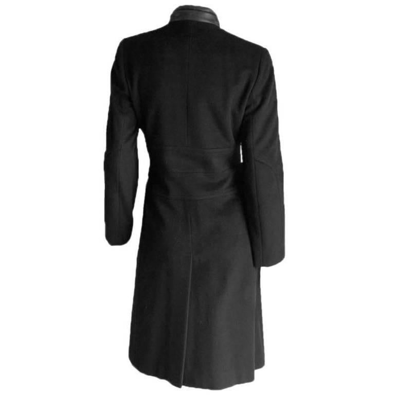 That Gorgeous Black Wool Cashmere Coat With The Leather Collar From Tom Ford's Fall Winter 2000 Collection For Gucci!

We've been international collectors of Tom Ford for Gucci & YSL since 2005, buying primarily for ourselves & wholesaling
