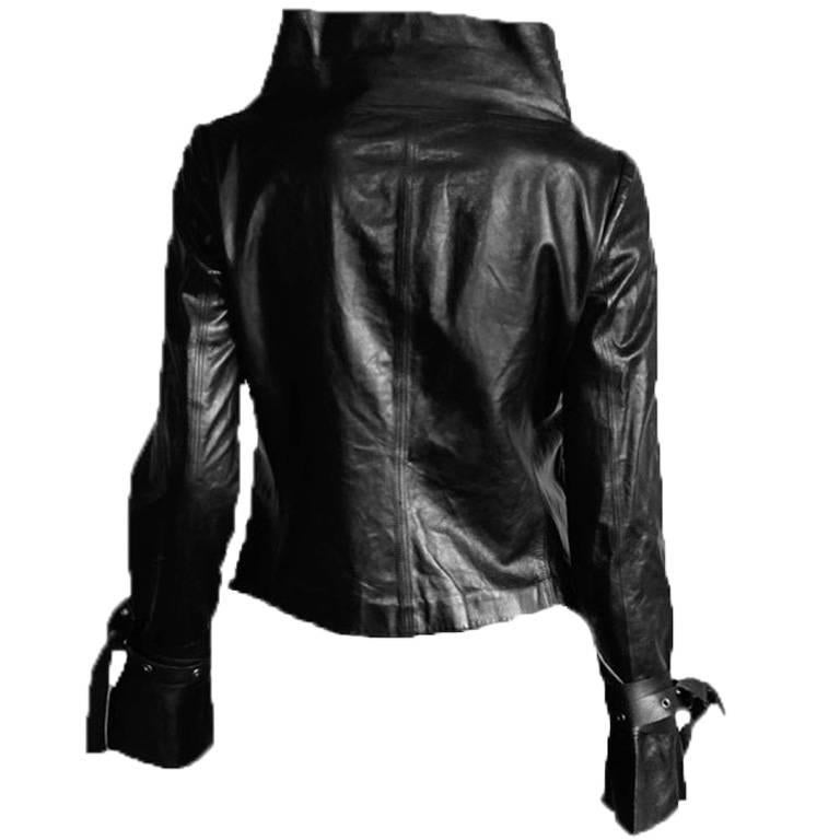 That Incredibly Rare Tom Ford For Gucci Spring Summer 2003 Black Leather "Bondage inspired" Runway Collection Jacket!

This heavenly jacket is an Italian size 40 & fits a US size 2 to 4 and even a small size 6 beautifully. This jacket