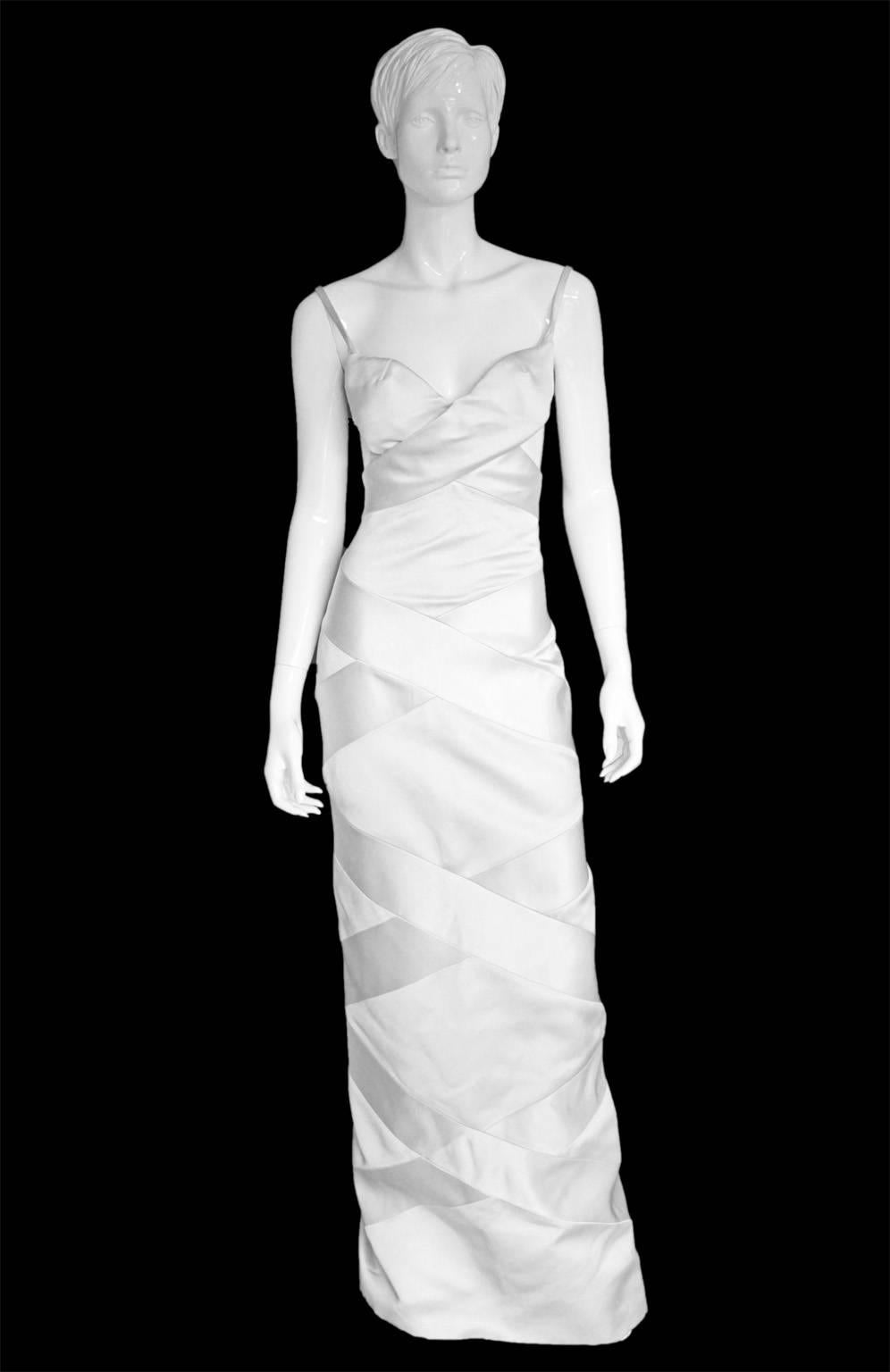 MOVING OS SO ALL CURRENT STOCK MUST GO!!!

Incredibly Rare Tom Ford For Gucci SS 2001 Collection White Bandage Gown!

Who could ever forget that incredible silk cross-over bra top from Tom Ford's amazing Spring/Summer 2001 collection for Gucci?
