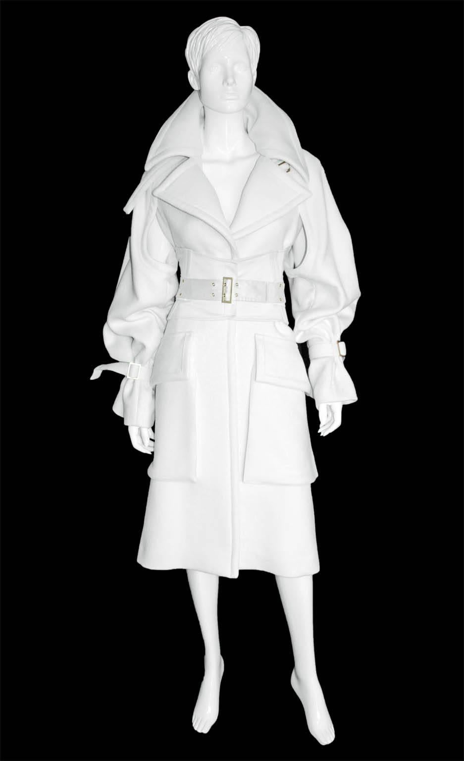 Considered by many to be his greatest collection of all, Tom Ford's fall winter 2003 collection for Gucci was simply awash with the most heavenly corseted gowns, dresses, coats & jackets in black, white & a wild assortment of rich, opulent jewel