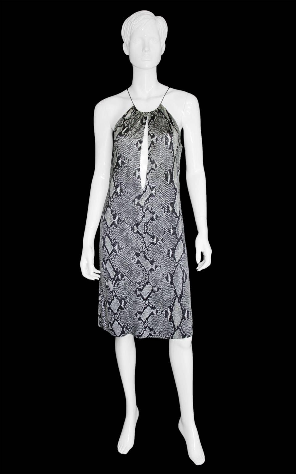 That amazing black & grey python print jersey dress from Tom Ford's gorgeous Spring/Summer 2000 Collection for Gucci! Considered one of the sexiest Tom Ford piece of all time, this utterly iconic dress is almost impossible to find today. This