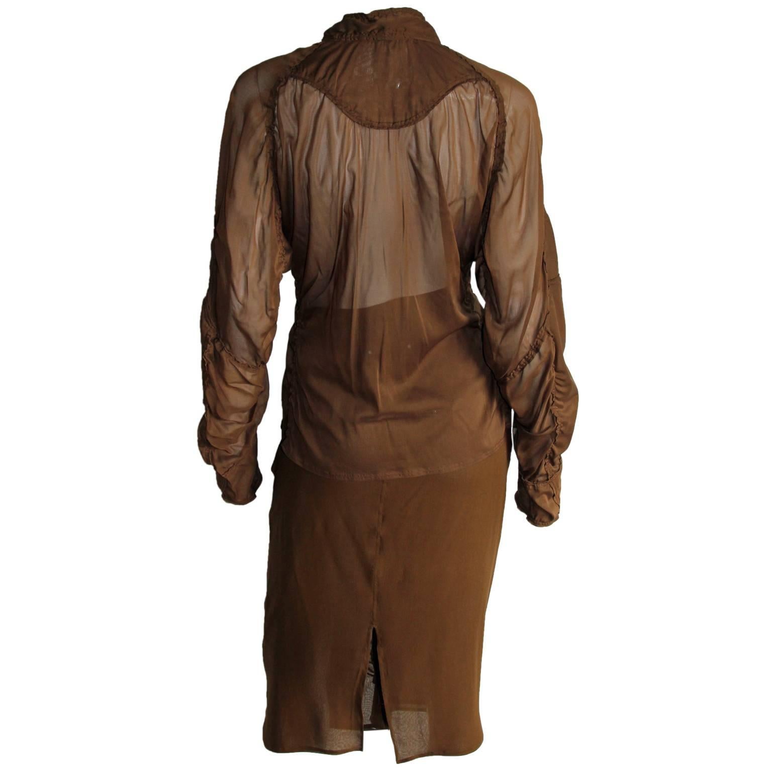 Rare & Iconic Tom Ford For YSL Rive Gauche Spring Summer 2002 Brown Silk Safari Collection Runway Jacket & Skirt Suit!

Iconic brown silk chiffon jacket & skirt suit from Tom Ford's acclaimed Spring/Summer 2002 Safari/Mombasa Runway