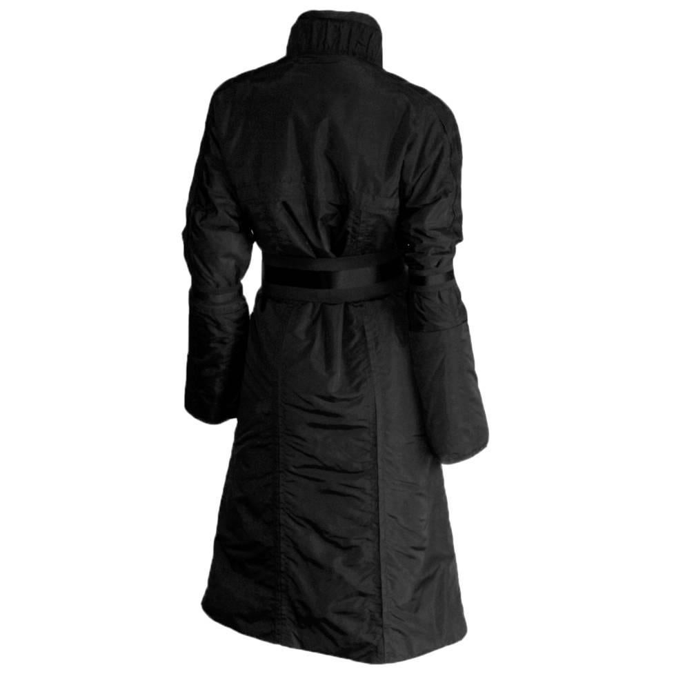 Considered by many to be his greatest collection of all, Tom Ford's fall winter 2004 collection for Gucci was simply awash with the most heavenly gowns, dresses, coats & jackets in black, white & a wild assortment of rich, opulent jewel colored
